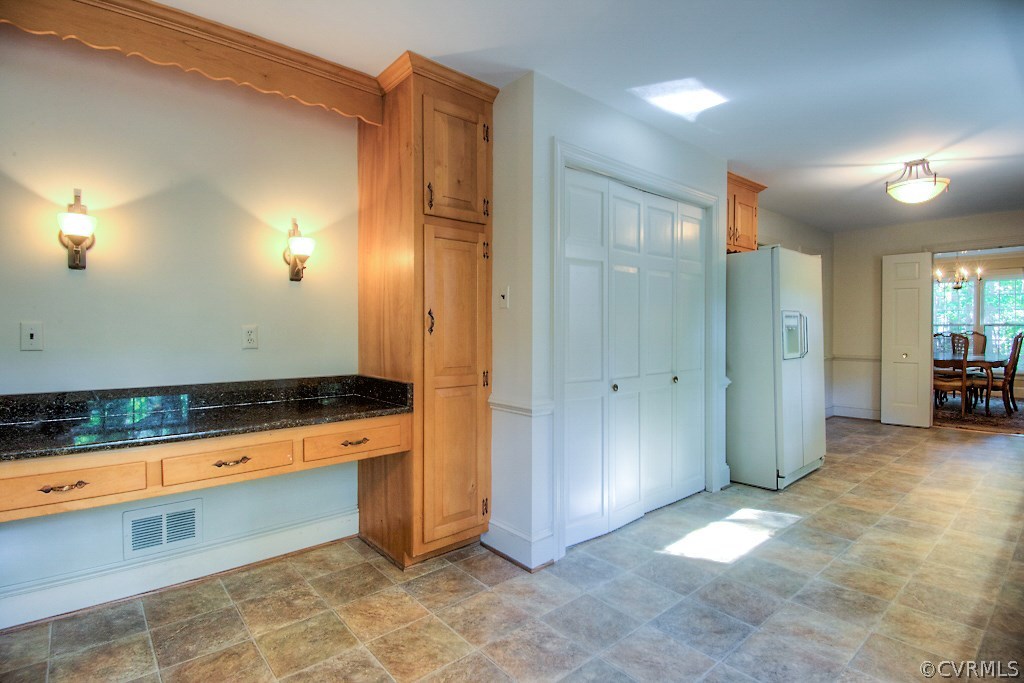 10021 Apache Road Richmond, VA 23235 - Photo 24 of 42 a view of kitchen with granite countertop cabinets and sink