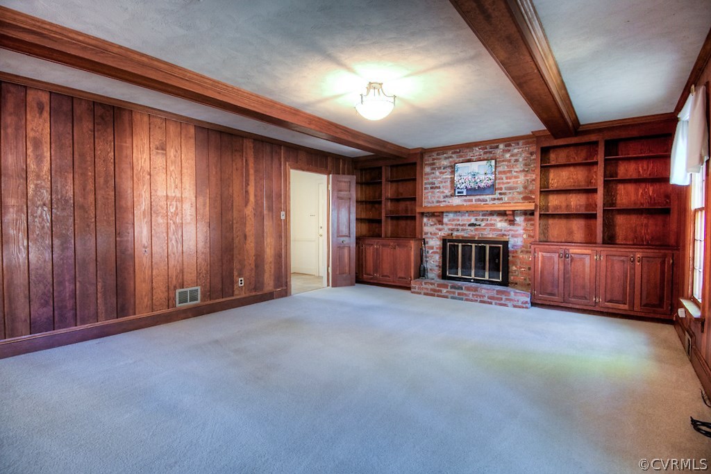 10021 Apache Road Richmond, VA 23235 - Photo 29 of 42 an empty room with fireplace and windows