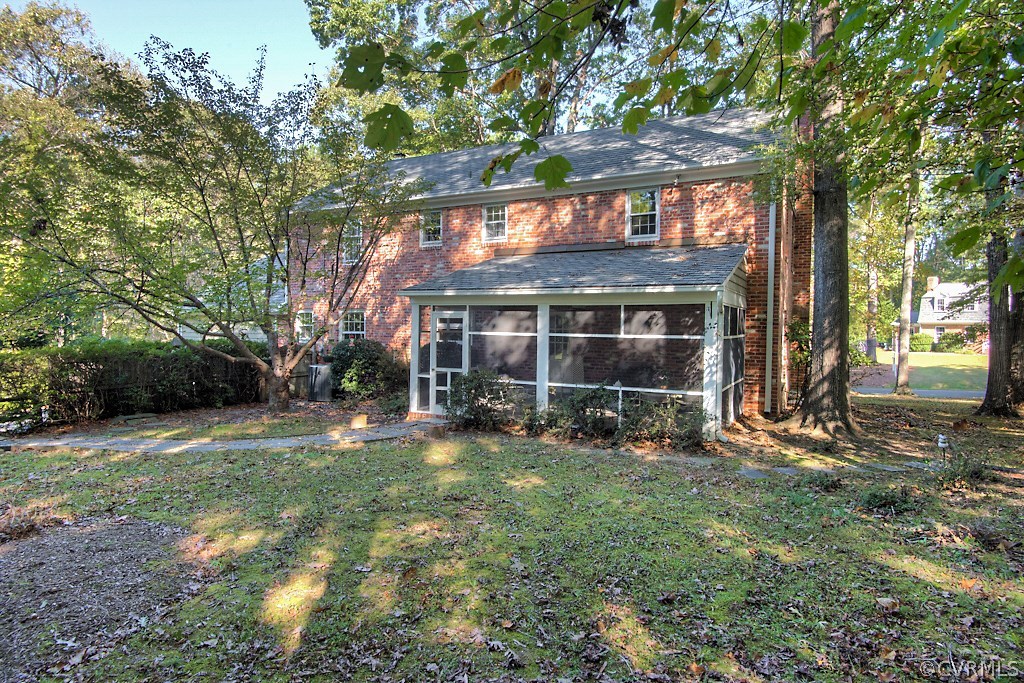10021 Apache Road Richmond, VA 23235 - Photo 10 of 42 a view of a house with a yard and sitting area