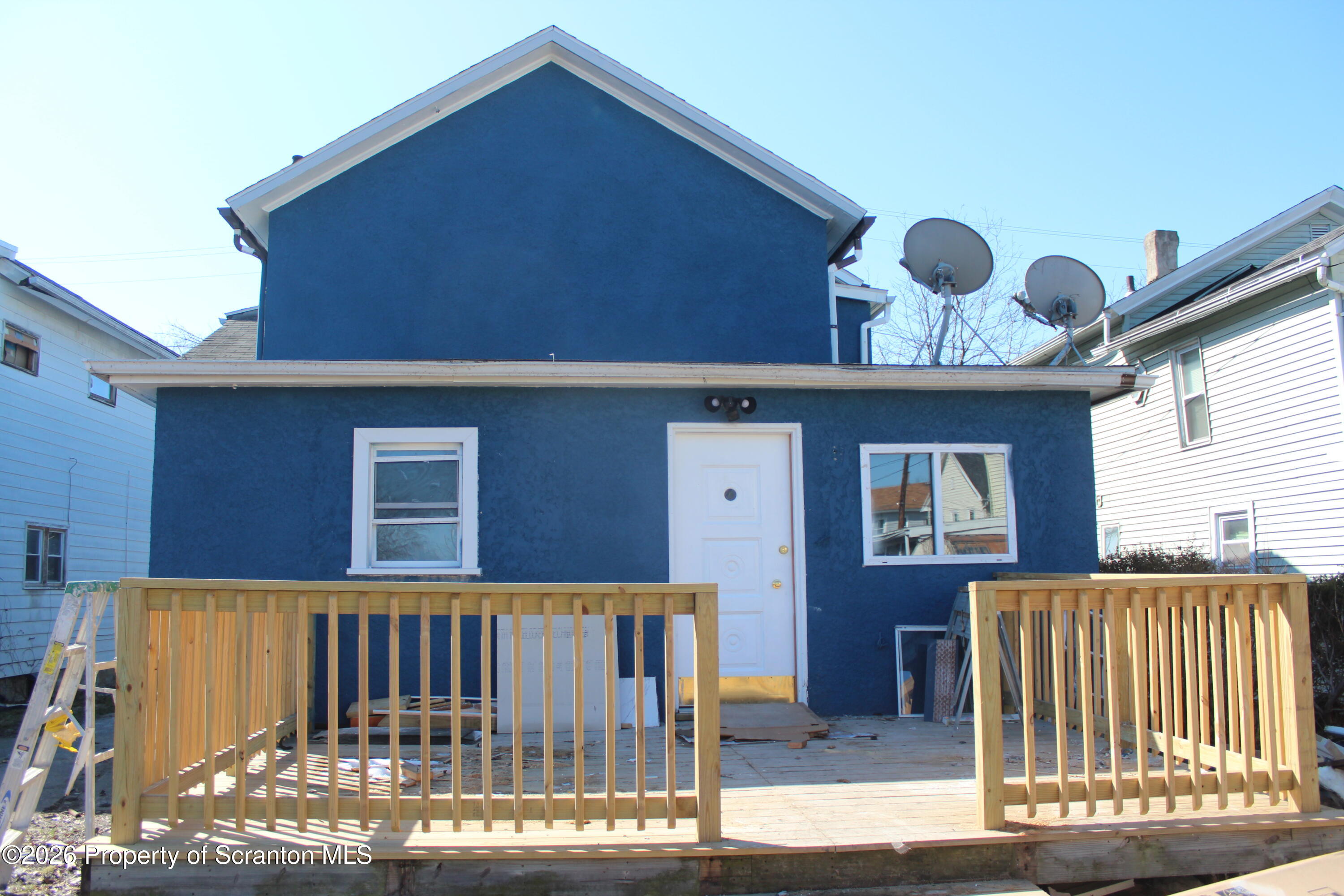 335 Phelps Street, Unit 2 REAR Scranton, PA 18509 - Photo 3 of 13 a view of a house with a porch