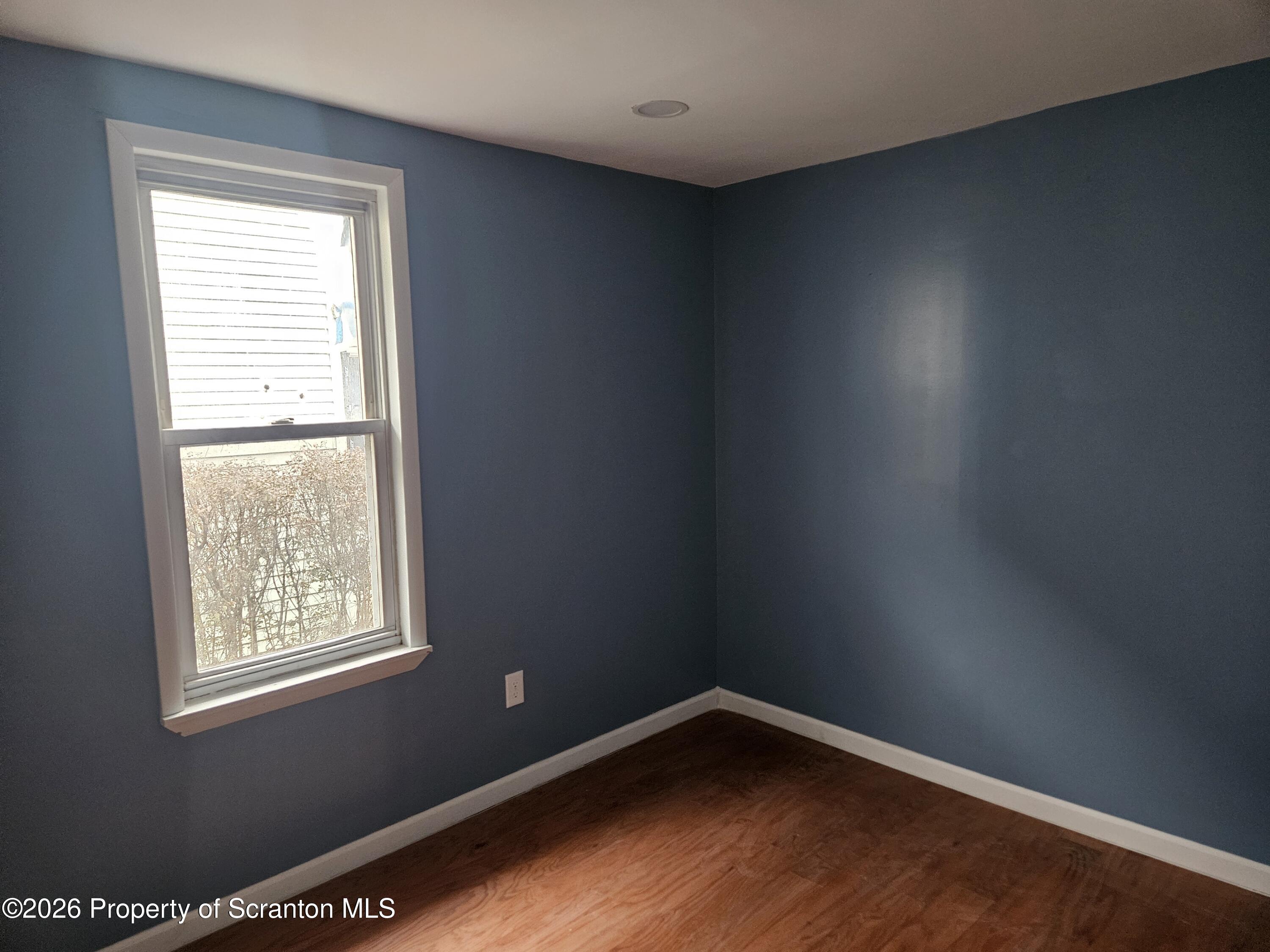 335 Phelps Street, Unit 2 REAR Scranton, PA 18509 - Photo 10 of 13 an empty room with a window