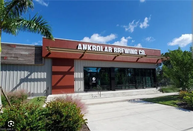 a kitchen with lots of bottles of alcohol