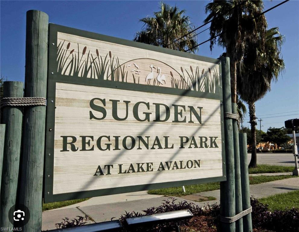 4021 Full Moon Court Naples, FL 34112 - Photo 15 of 23 a sign on the side of a building