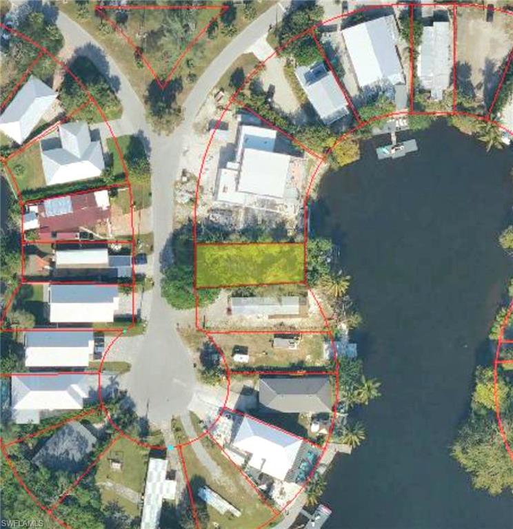 4021 Full Moon Court Naples, FL 34112 - Photo 23 of 23 an aerial view of a houses with yard