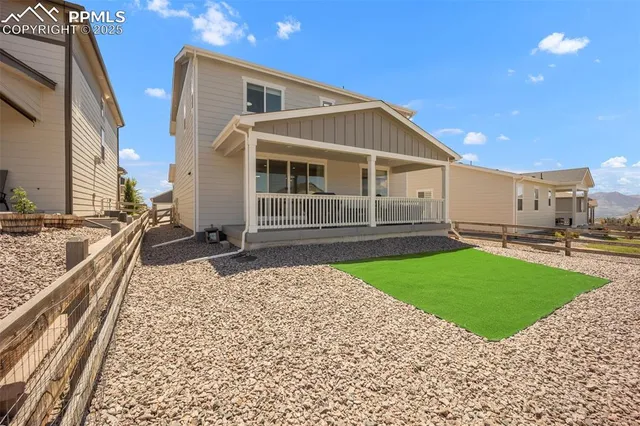 a front view of a house with yard