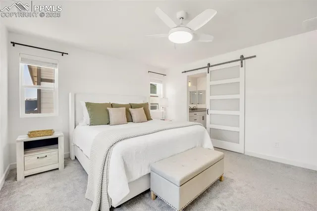 a bathroom with a shower sink and mirror