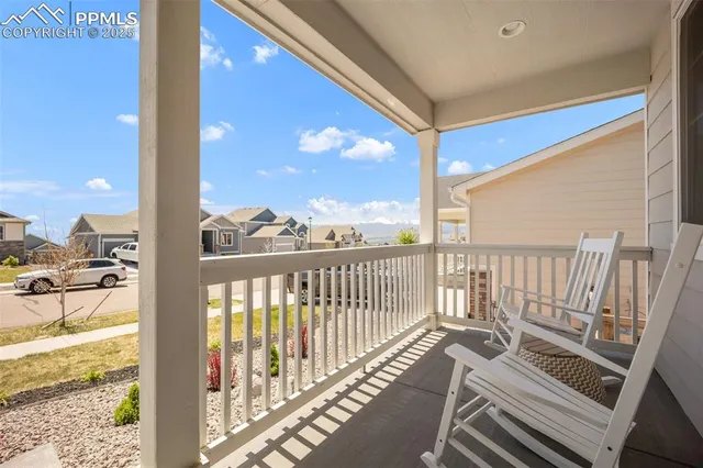 a view of a balcony with lake view and a ocean view