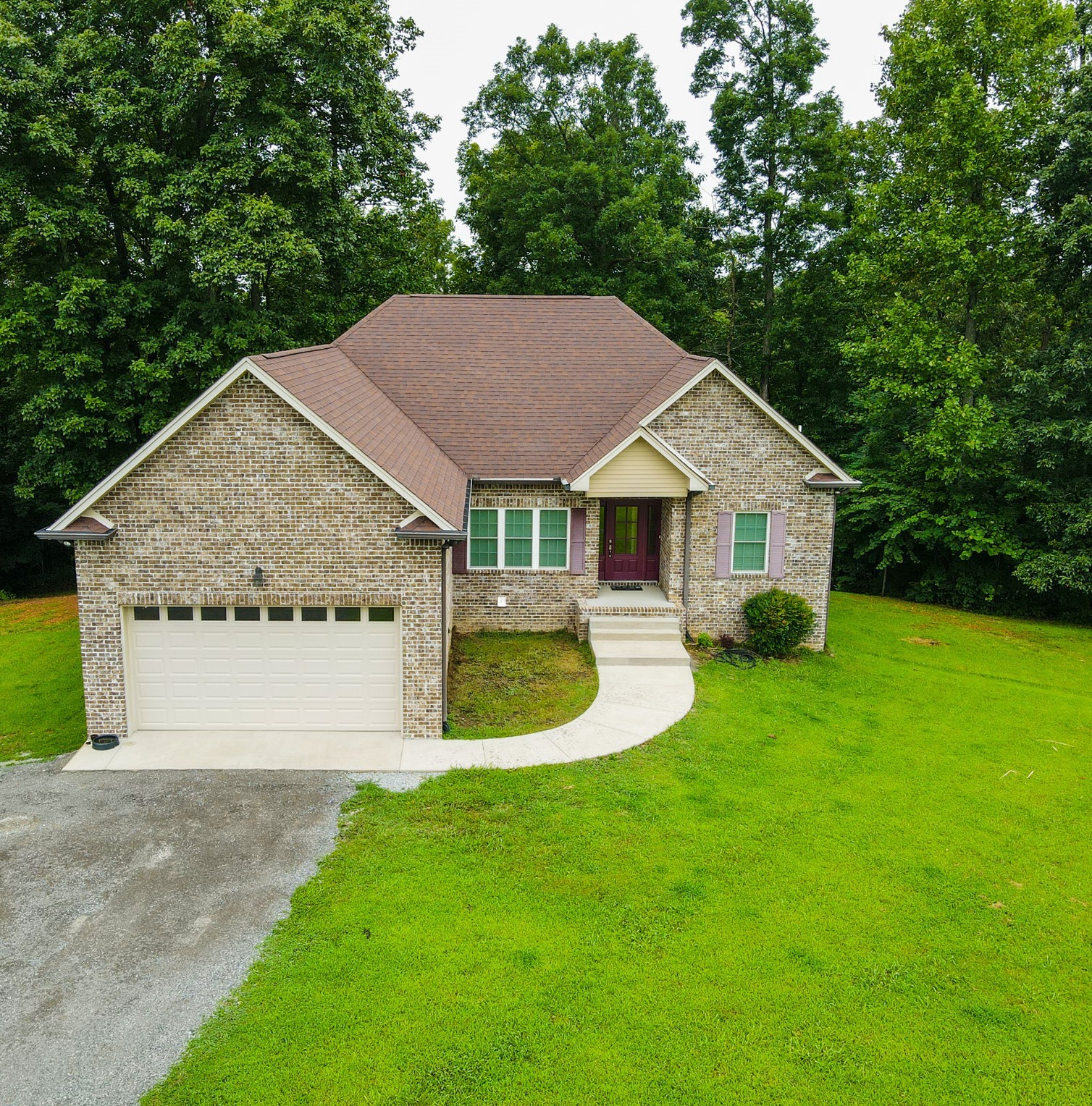 4605 Cole Ridge Road Beechgrove, TN 37018 - Photo 1 of 30 a front view of a house with garden