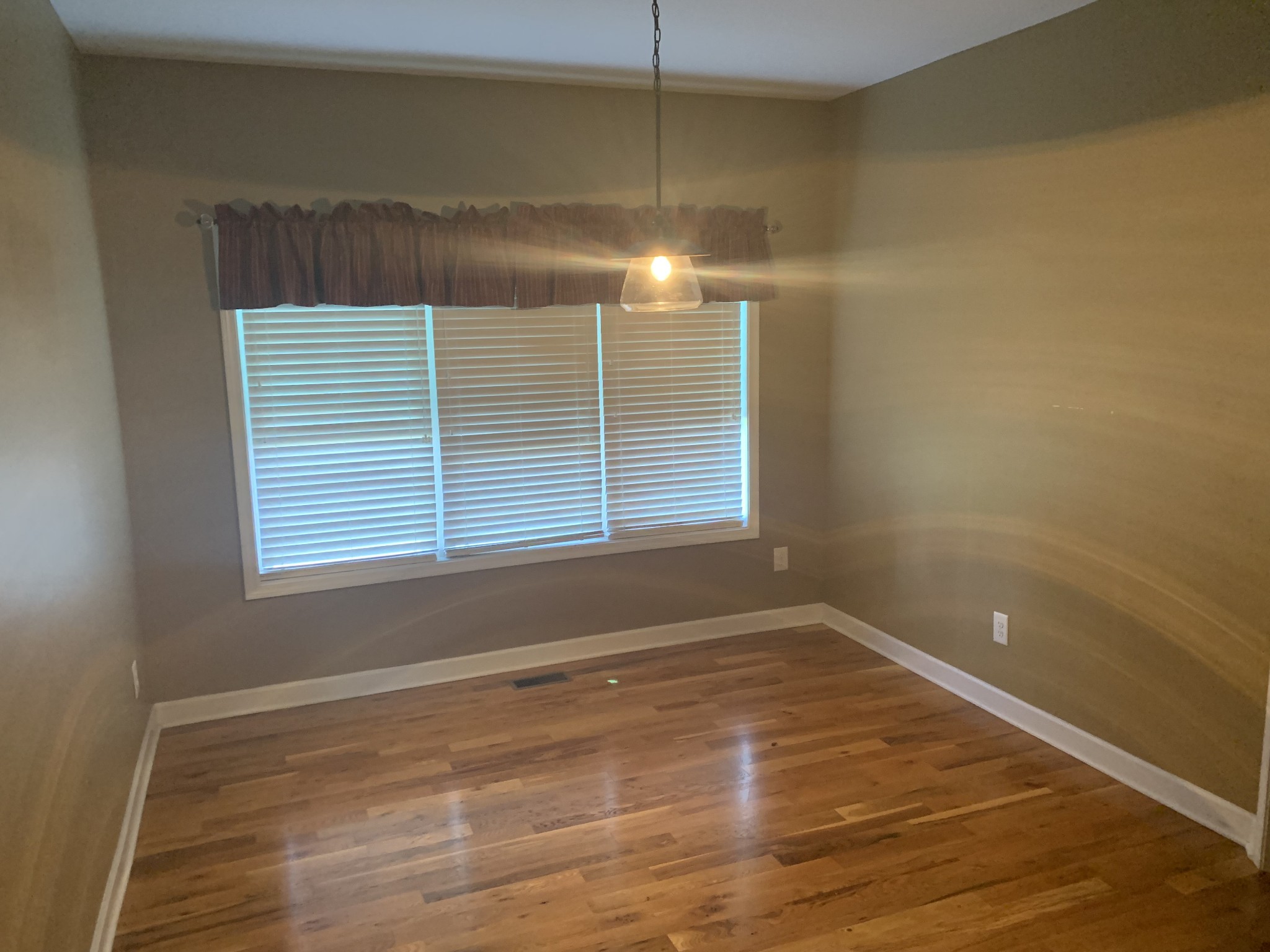 4605 Cole Ridge Road Beechgrove, TN 37018 - Photo 12 of 30 a view of empty room with wooden floor and fan