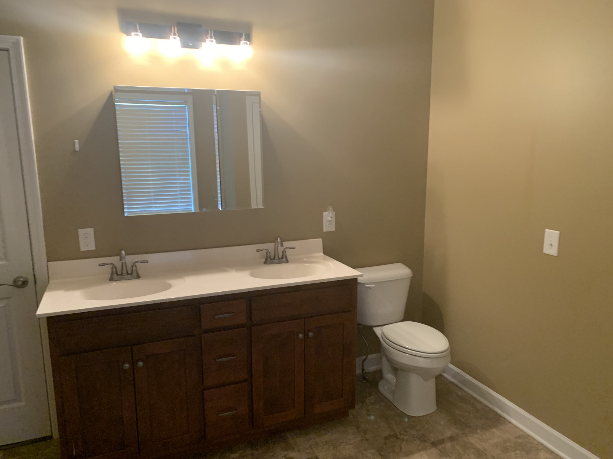 4605 Cole Ridge Road Beechgrove, TN 37018 - Photo 17 of 30 a bathroom with a toilet sink and mirror