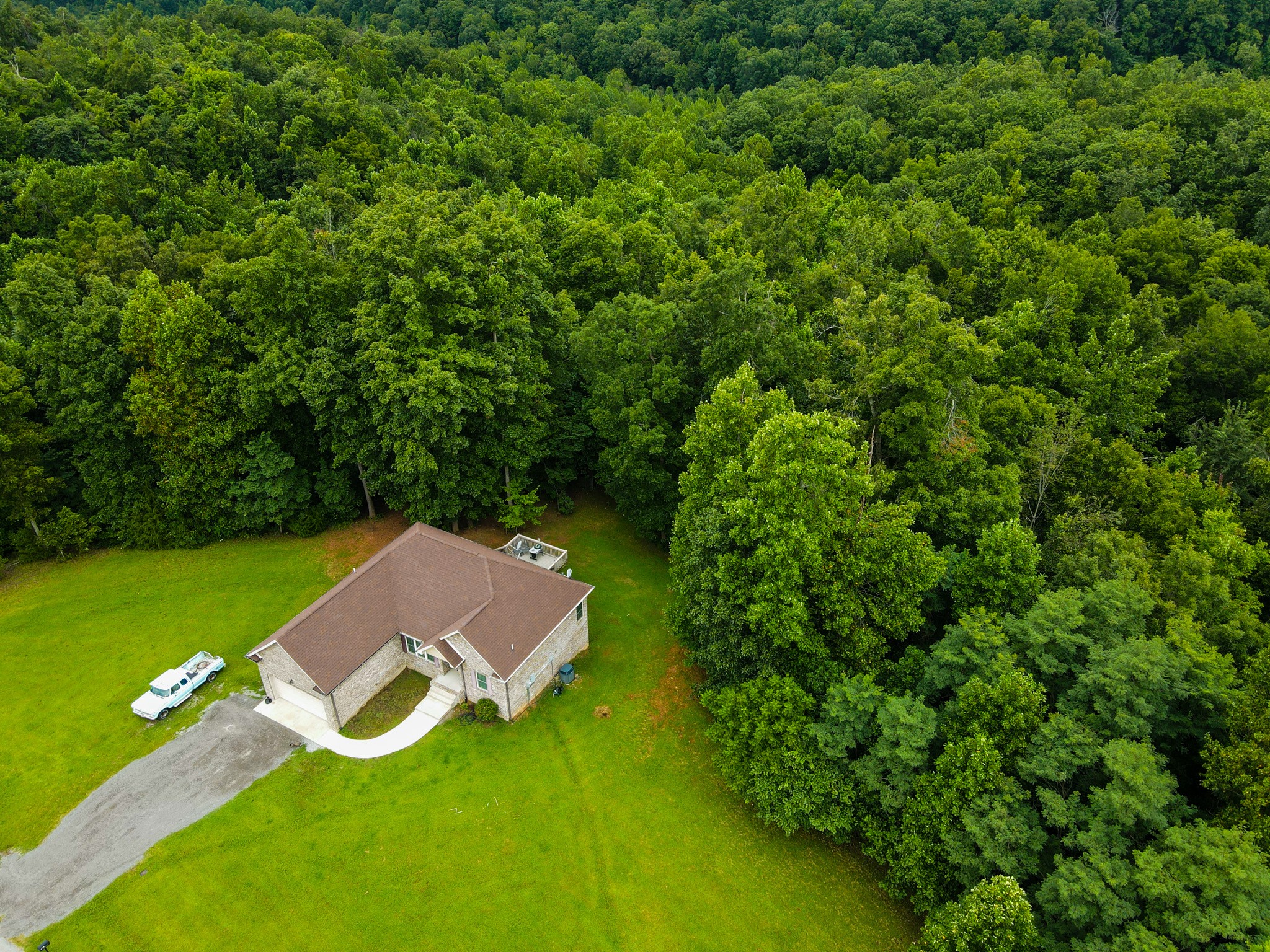 4605 Cole Ridge Road Beechgrove, TN 37018 - Photo 3 of 30 an aerial view of a house with a backyard