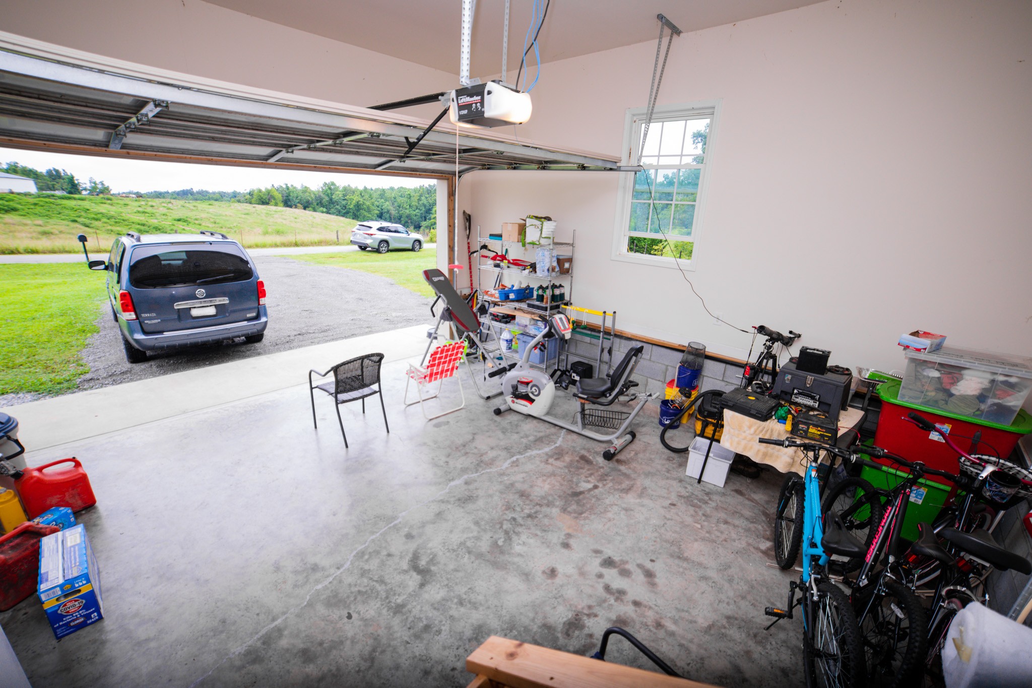 4605 Cole Ridge Road Beechgrove, TN 37018 - Photo 21 of 30 a view of a garage with a bike and a car
