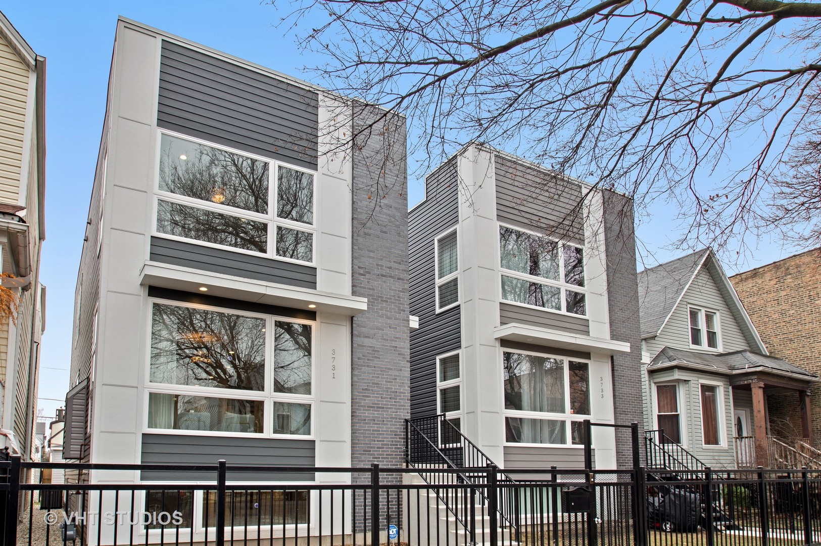 3731 West Lyndale Street Chicago, IL 60647 - Photo 1 of 5 a front view of a multi story building