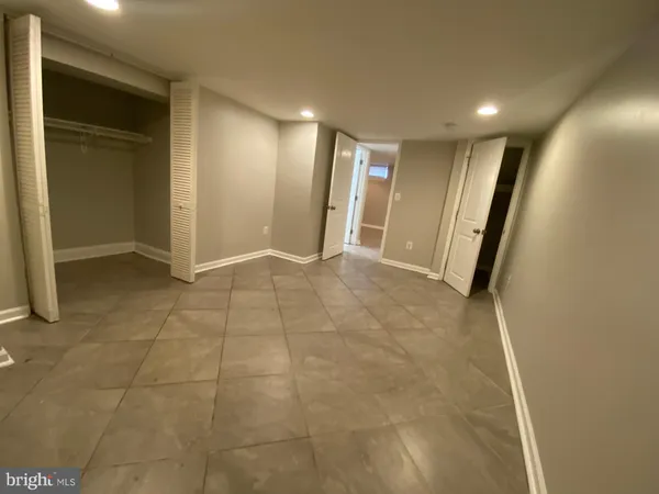 a bathroom with a toilet a sink and bathtub
