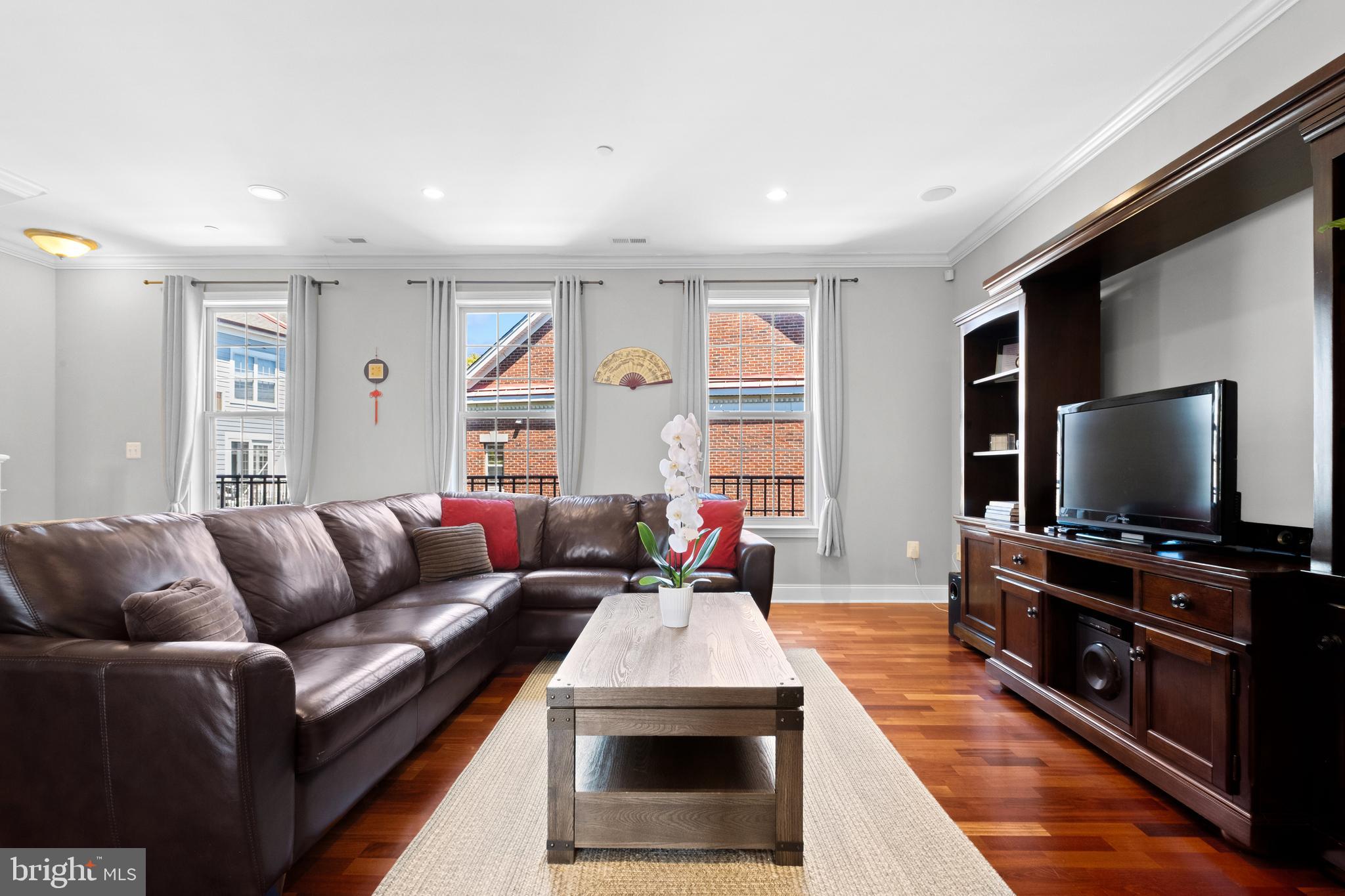 203 Captains Way Philadelphia, PA 19146 - Photo 1 of 58 a living room with furniture and a flat screen tv
