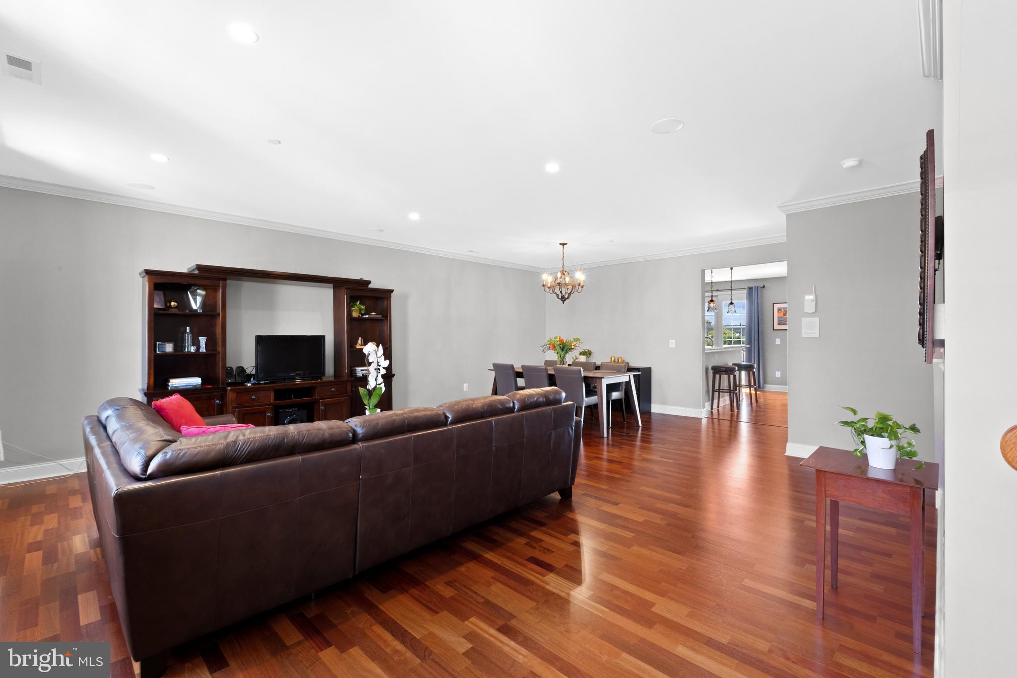 203 Captains Way Philadelphia, PA 19146 - Photo 11 of 58 a living room with furniture and a wooden floor