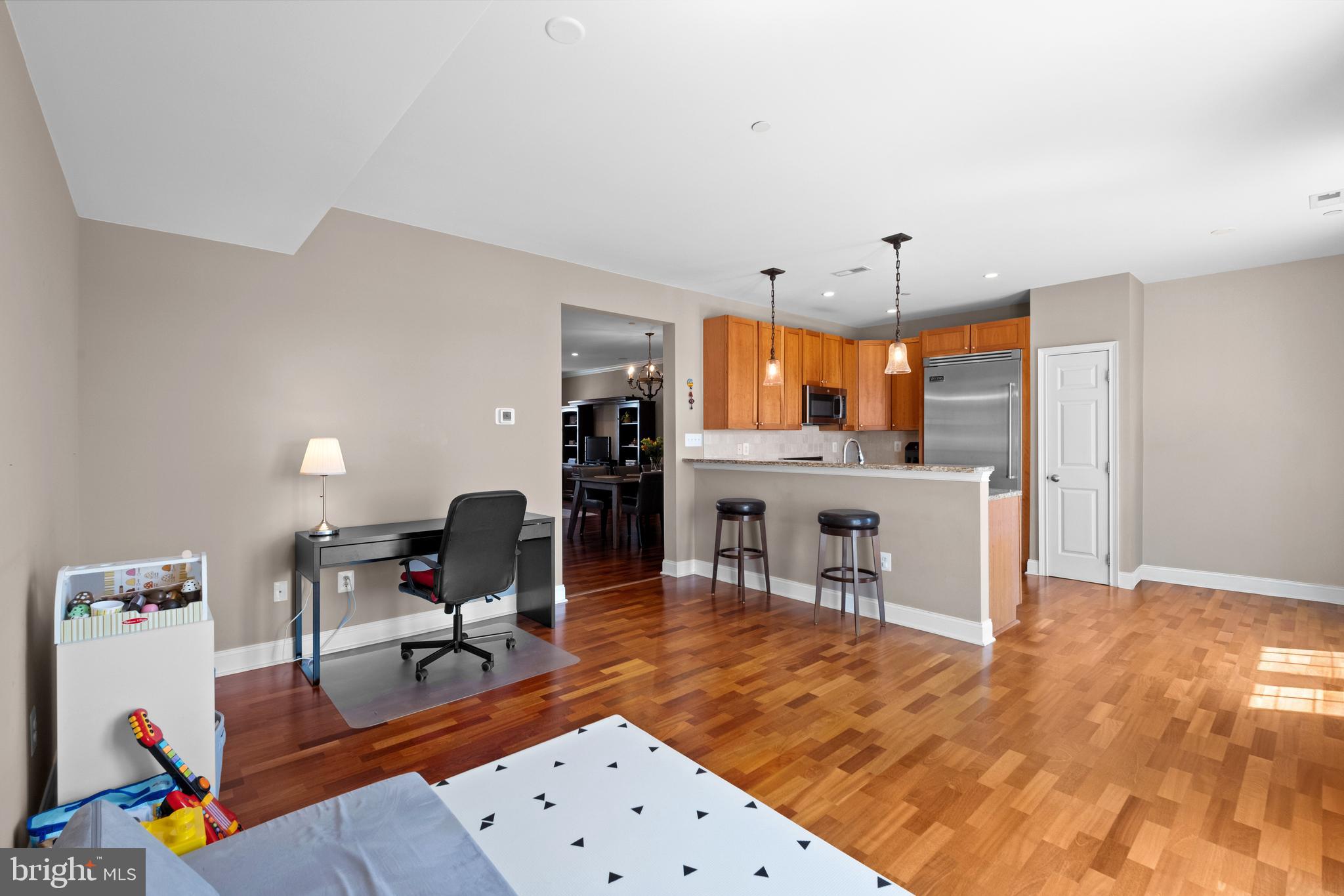 203 Captains Way Philadelphia, PA 19146 - Photo 17 of 58 a living room with furniture and kitchen view