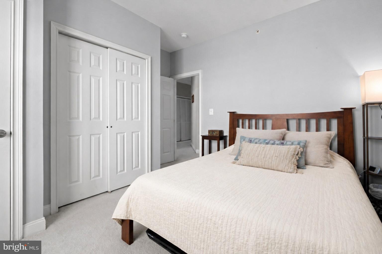 203 Captains Way Philadelphia, PA 19146 - Photo 30 of 58 a bedroom with a bed and a window