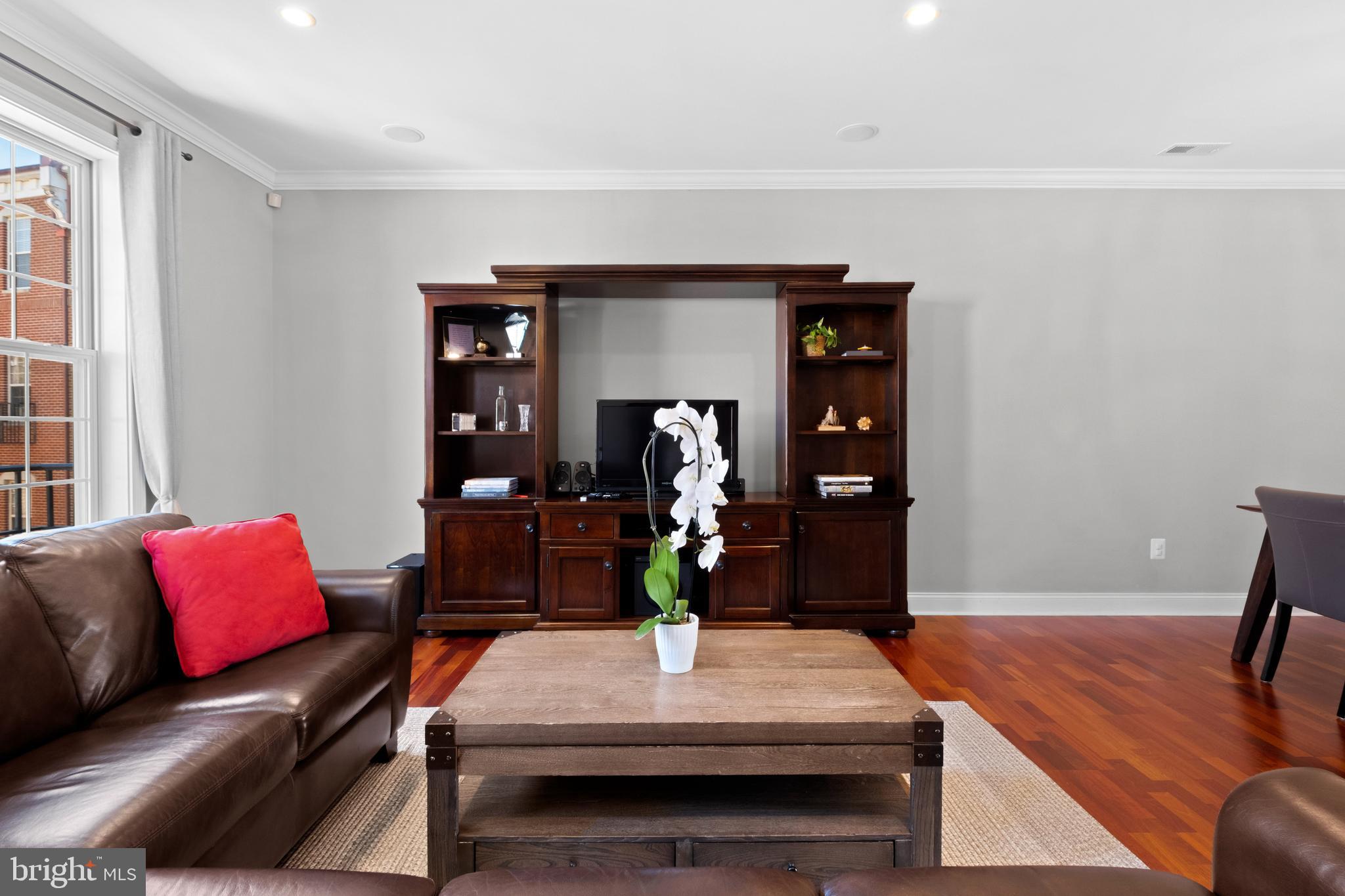 203 Captains Way Philadelphia, PA 19146 - Photo 3 of 58 a living room with furniture and wooden floor