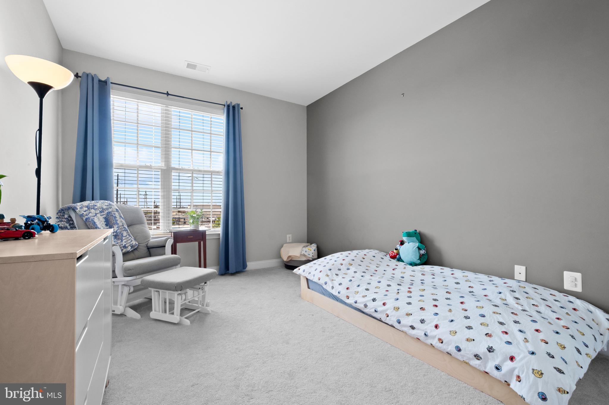 203 Captains Way Philadelphia, PA 19146 - Photo 33 of 58 a bedroom with furniture and window