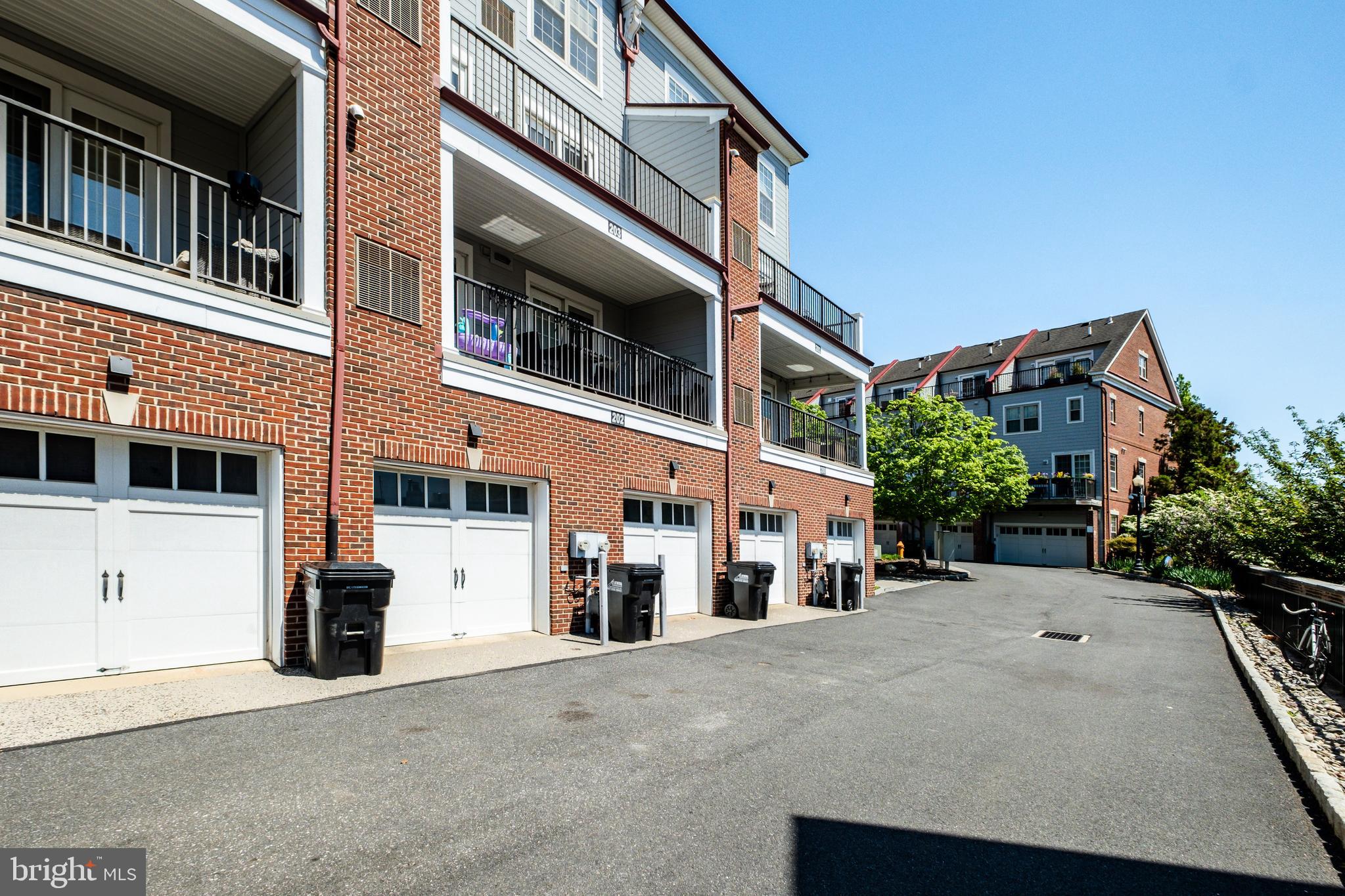 203 Captains Way Philadelphia, PA 19146 - Photo 44 of 58 front view of a building with a street
