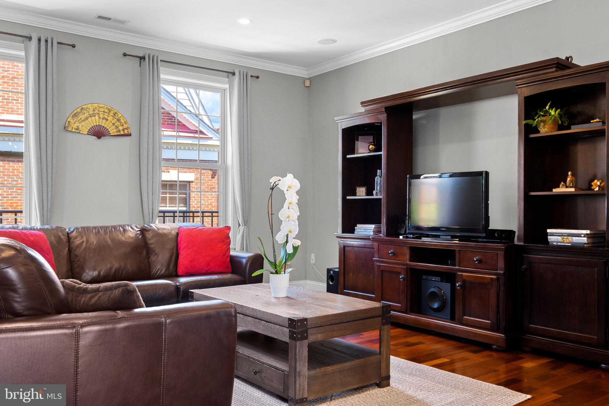 203 Captains Way Philadelphia, PA 19146 - Photo 5 of 58 a living room with furniture and a flat screen tv