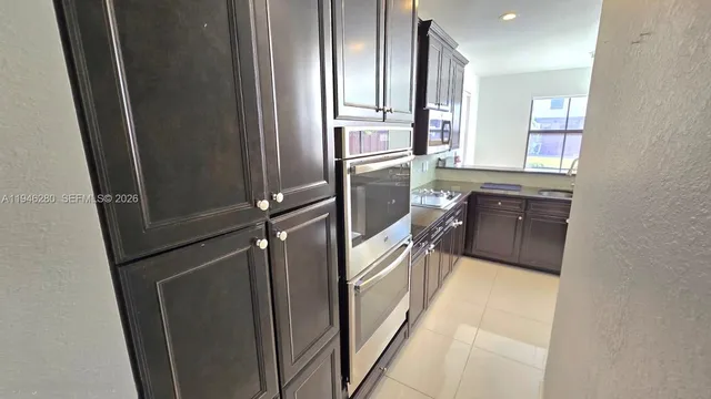 $990,000 | 10032 Northwest 87th Terrace, Doral, FL 33178