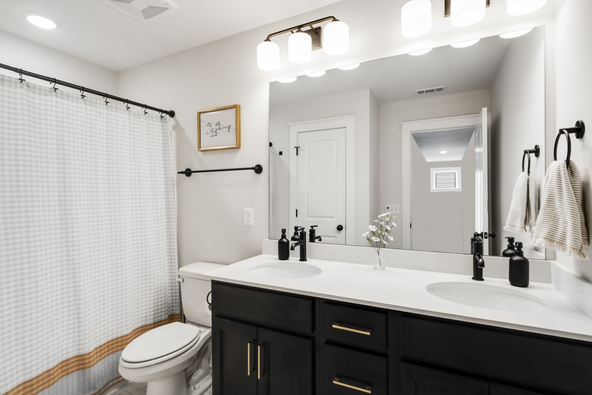 3548 Rockledge Way Murfreesboro, TN 37129 - Photo 18 of 28 a bathroom with a double vanity sink toilet and a mirror