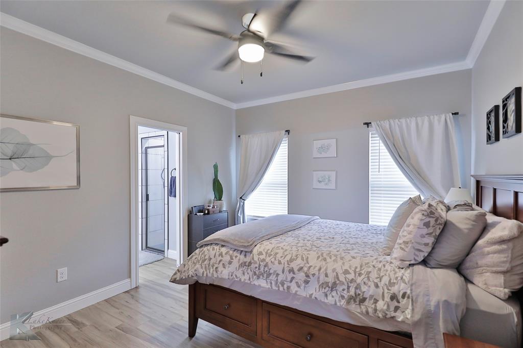 7329 Mountain View Road Abilene, TX 79602 - Photo 16 of 33 a living room with furniture and wooden floor