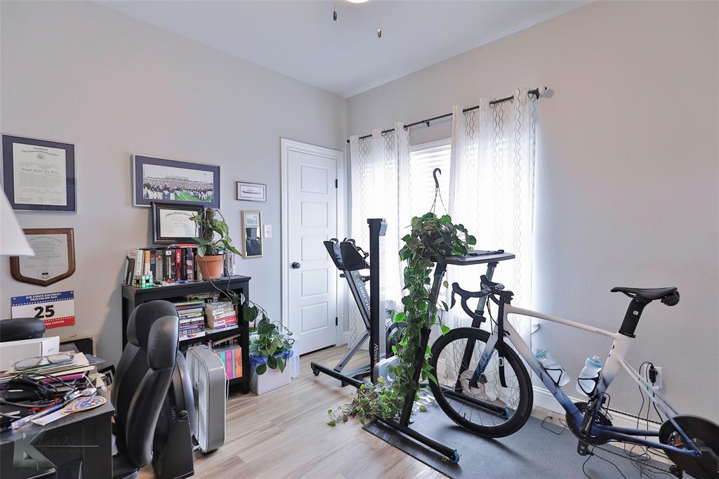 7329 Mountain View Road Abilene, TX 79602 - Photo 29 of 33 a view of a workspace with gym equipment
