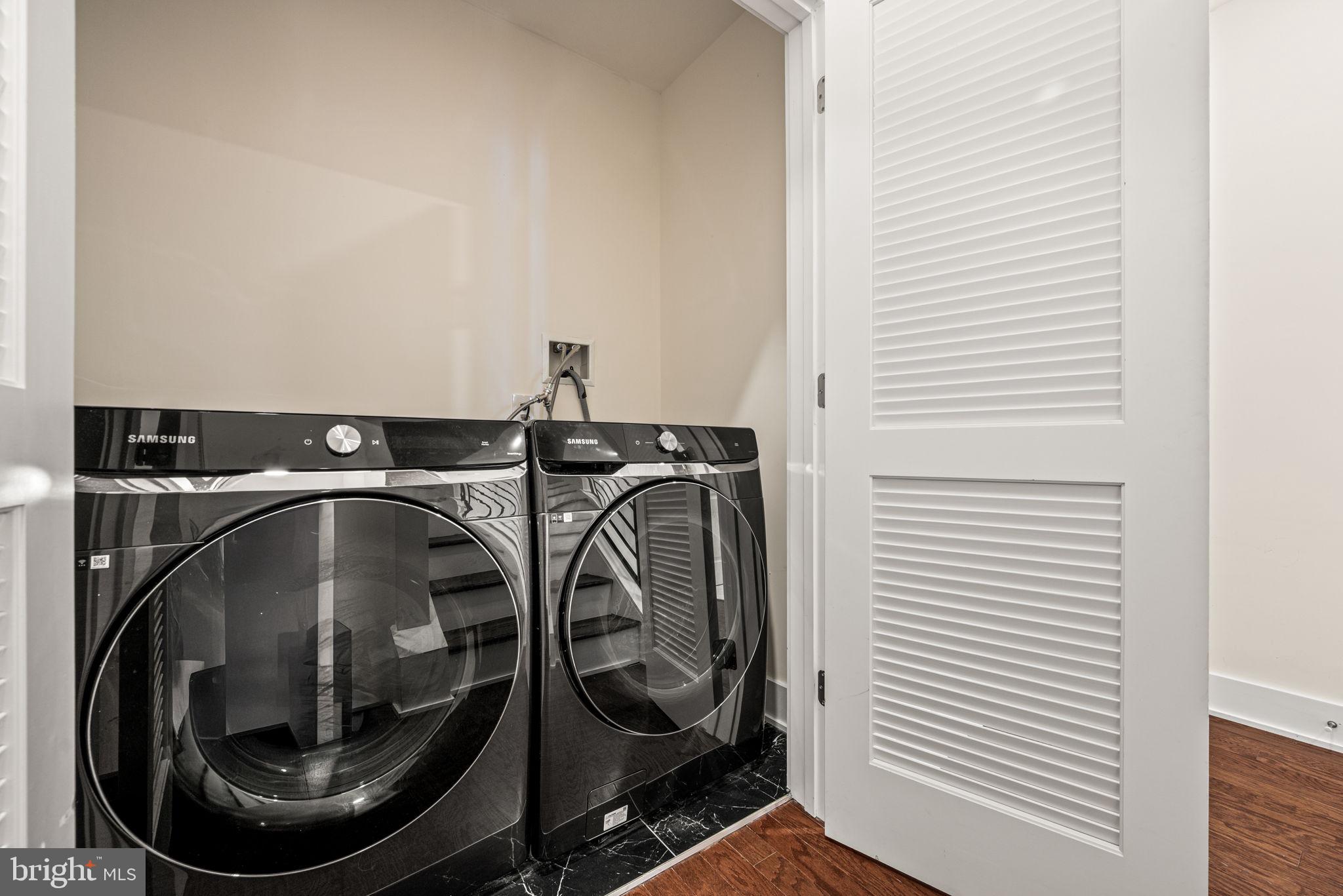 1115 North American Street, Unit D5 Philadelphia, PA 19123 - Photo 23 of 52 a utility room with dryer and washer