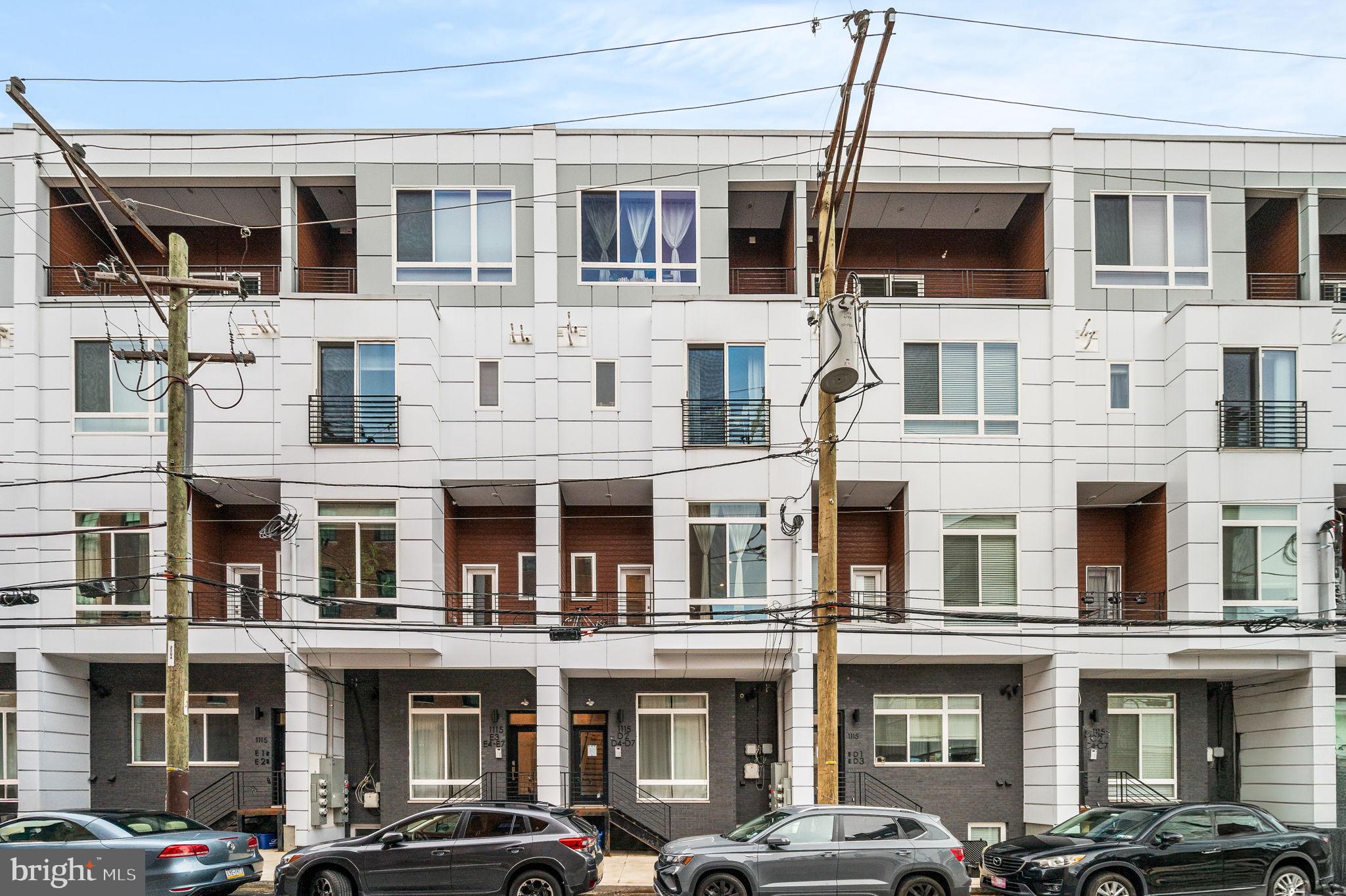 1115 North American Street, Unit D5 Philadelphia, PA 19123 - Photo 4 of 52 a front view of large building yard