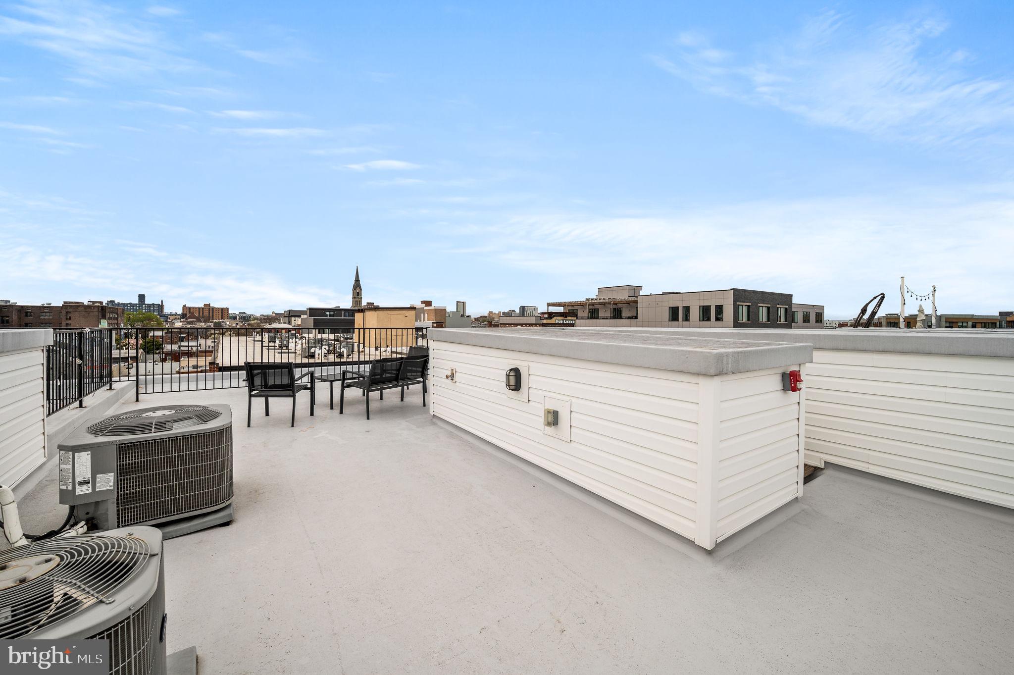 1115 North American Street, Unit D5 Philadelphia, PA 19123 - Photo 42 of 52 a view of a terrace with chairs