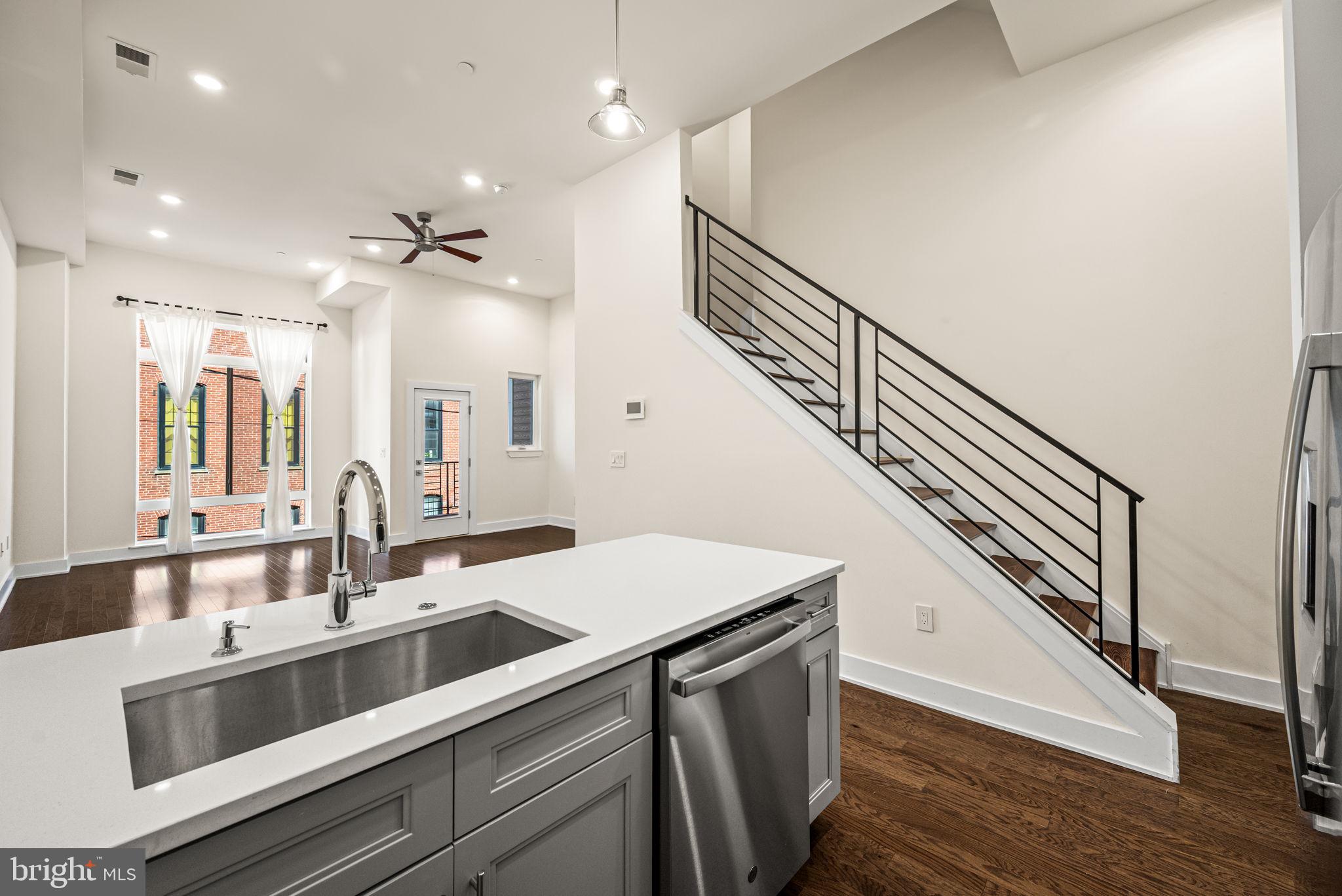 1115 North American Street, Unit D5 Philadelphia, PA 19123 - Photo 6 of 52 a bathroom with a sink and a mirror