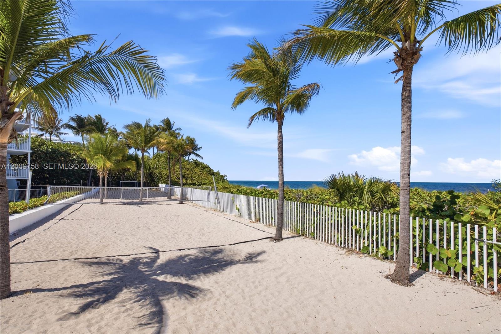 605 Ocean Drive, Unit 7L Key Biscayne, FL 33149 - Photo 28 of 38 a view of a garden with palm trees