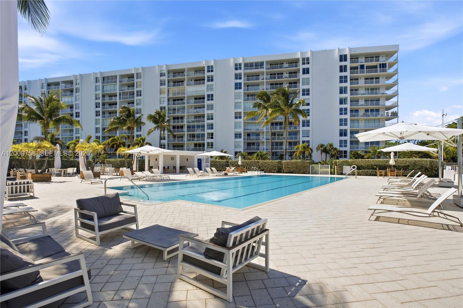 605 Ocean Drive, Unit 7L Key Biscayne, FL 33149 - Photo 29 of 38 a view of swimming pool with outdoor seating