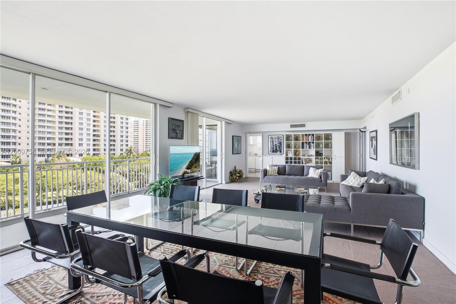 605 Ocean Drive, Unit 7L Key Biscayne, FL 33149 - Photo 5 of 38 a view of a dining room with furniture window and outside view
