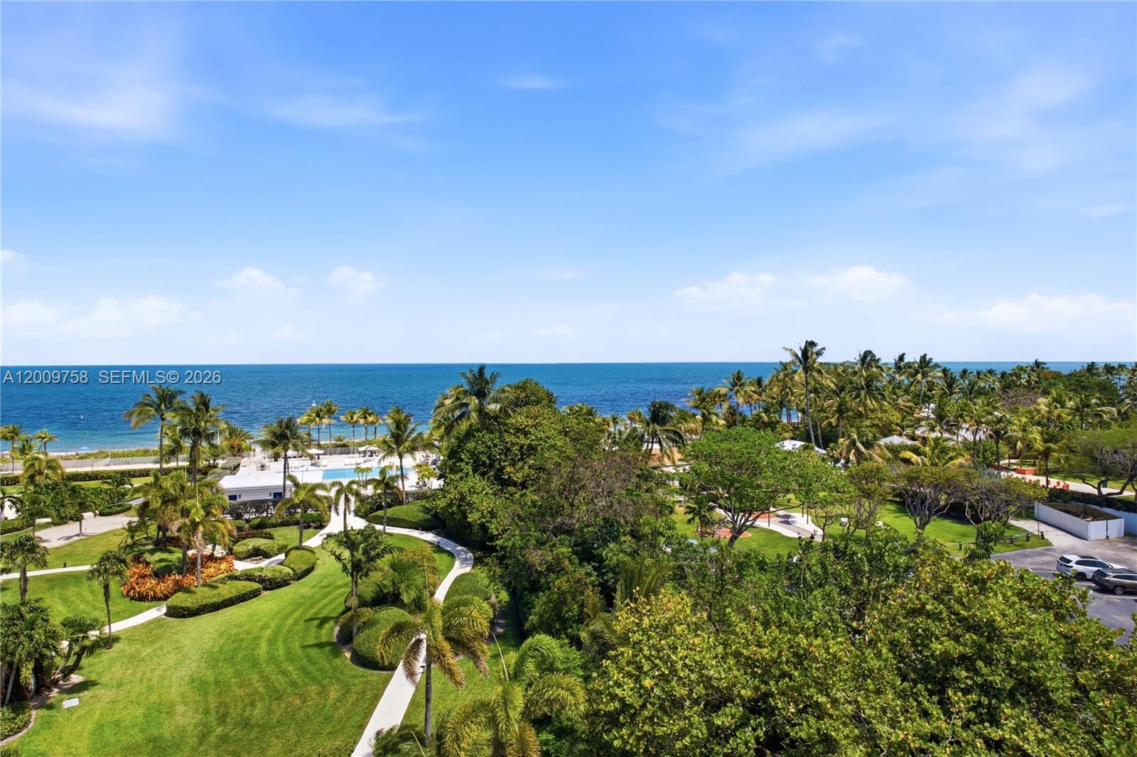 605 Ocean Drive, Unit 7L Key Biscayne, FL 33149 - Photo 7 of 38 an aerial view of a houses with a yard