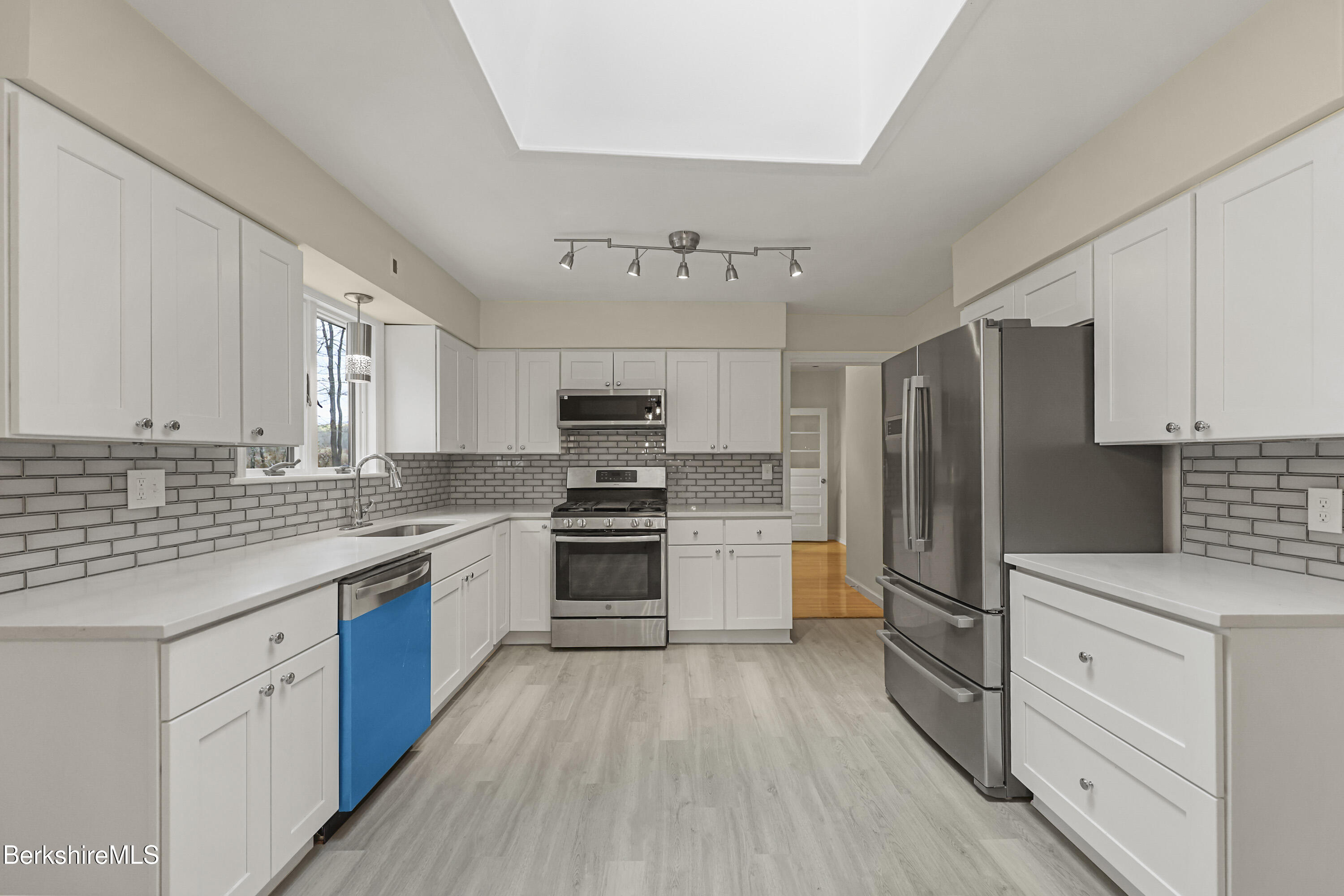 627 Lenox Road Richmond, MA 01254 - Photo 18 of 37 a kitchen with stainless steel appliances a refrigerator stove and sink