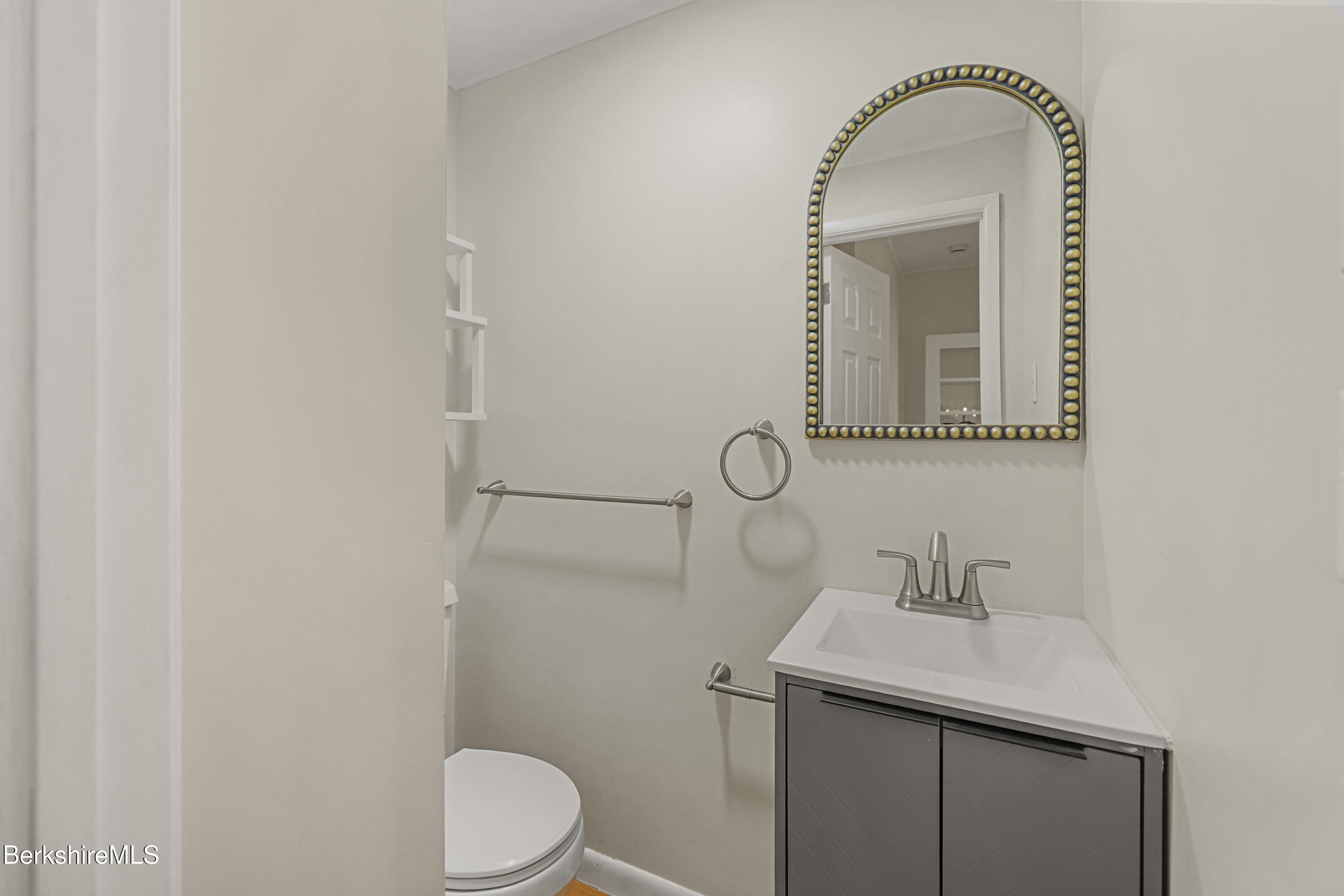 627 Lenox Road Richmond, MA 01254 - Photo 23 of 37 a bathroom with a sink a toilet and mirror