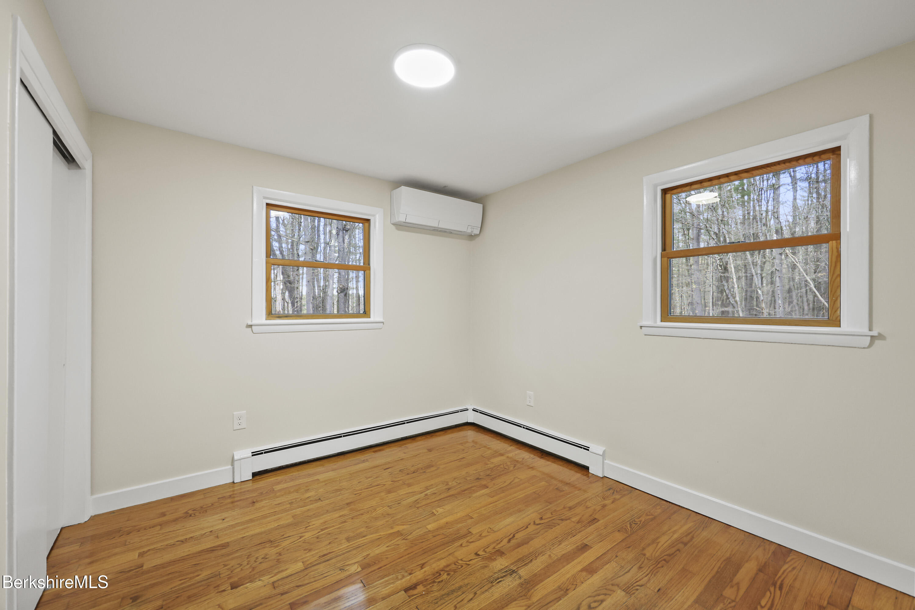 627 Lenox Road Richmond, MA 01254 - Photo 24 of 37 a view of an empty room with a window