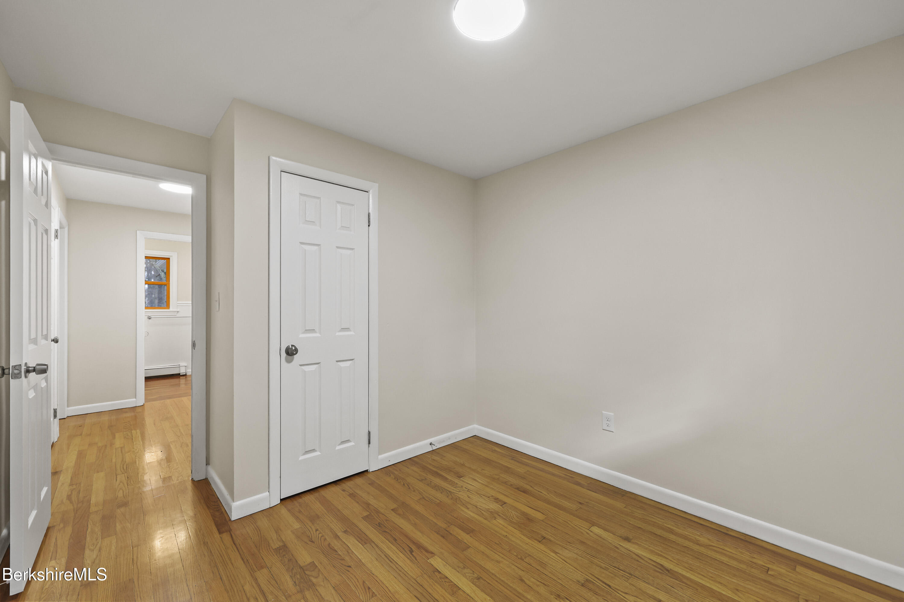 627 Lenox Road Richmond, MA 01254 - Photo 29 of 37 a view of a room with wooden floor