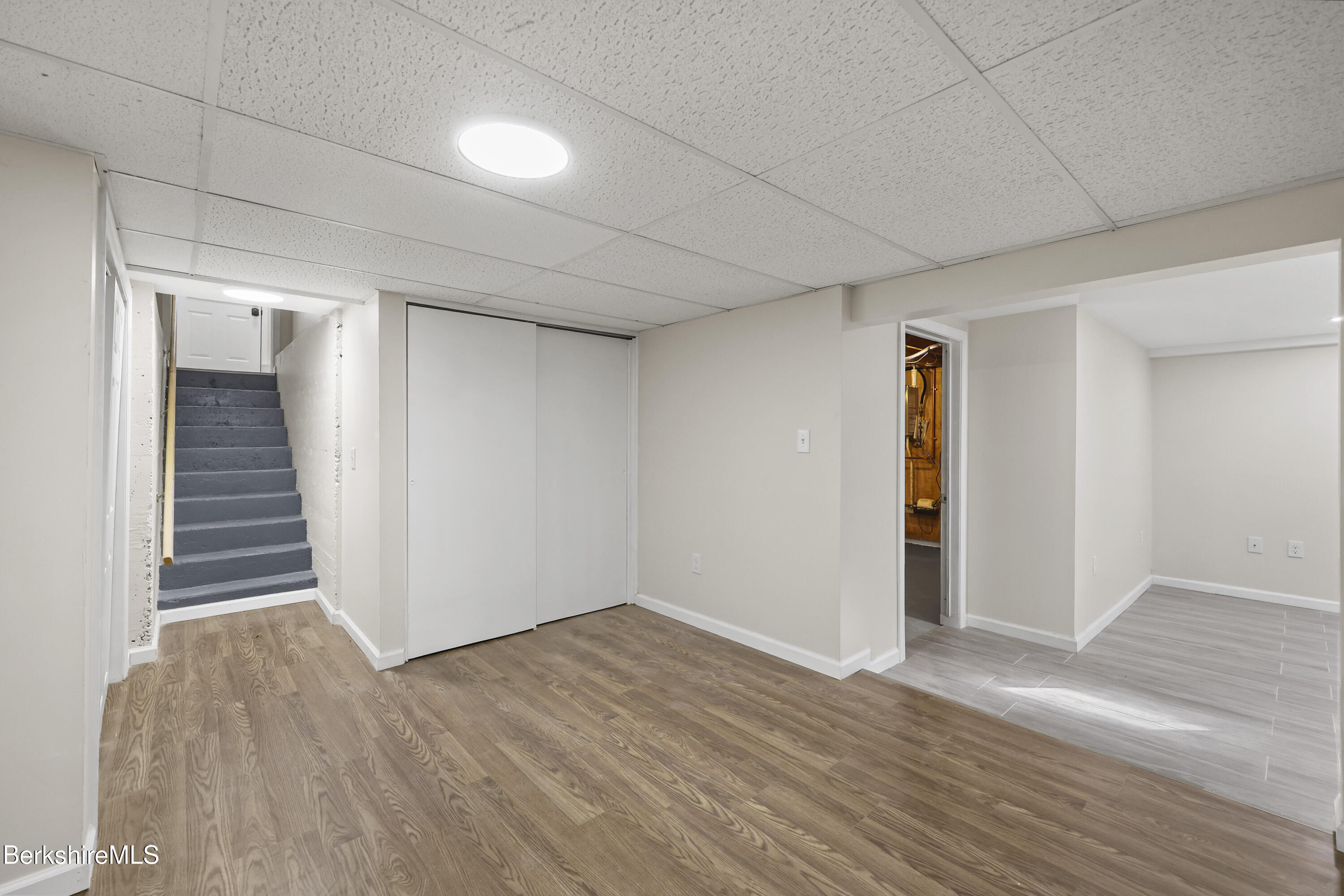 627 Lenox Road Richmond, MA 01254 - Photo 33 of 37 a view of an empty room with wooden floor