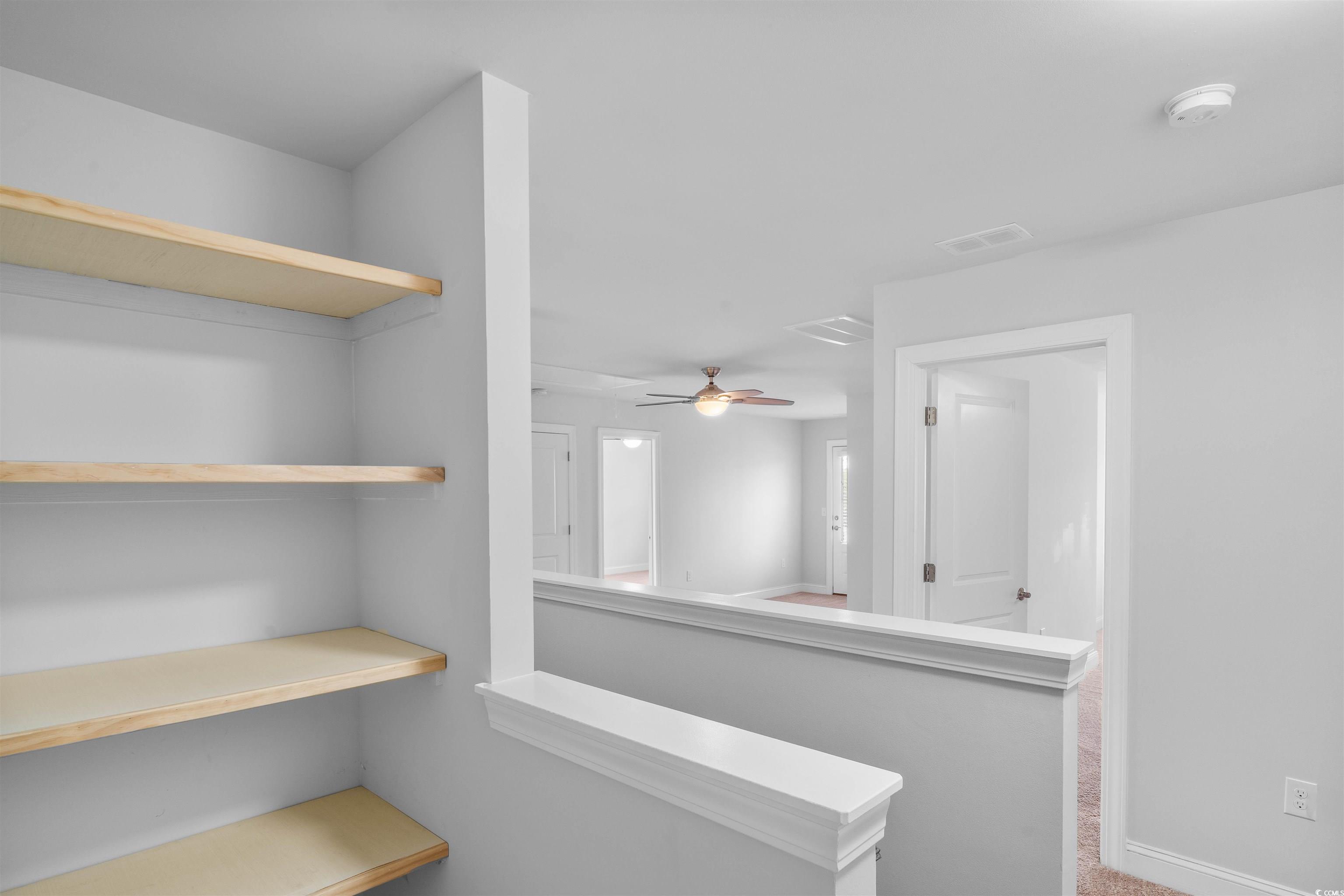 1141 Bronwyn Circle North Myrtle Beach, SC 29582 - Photo 24 of 40 Hallway with light colored carpet