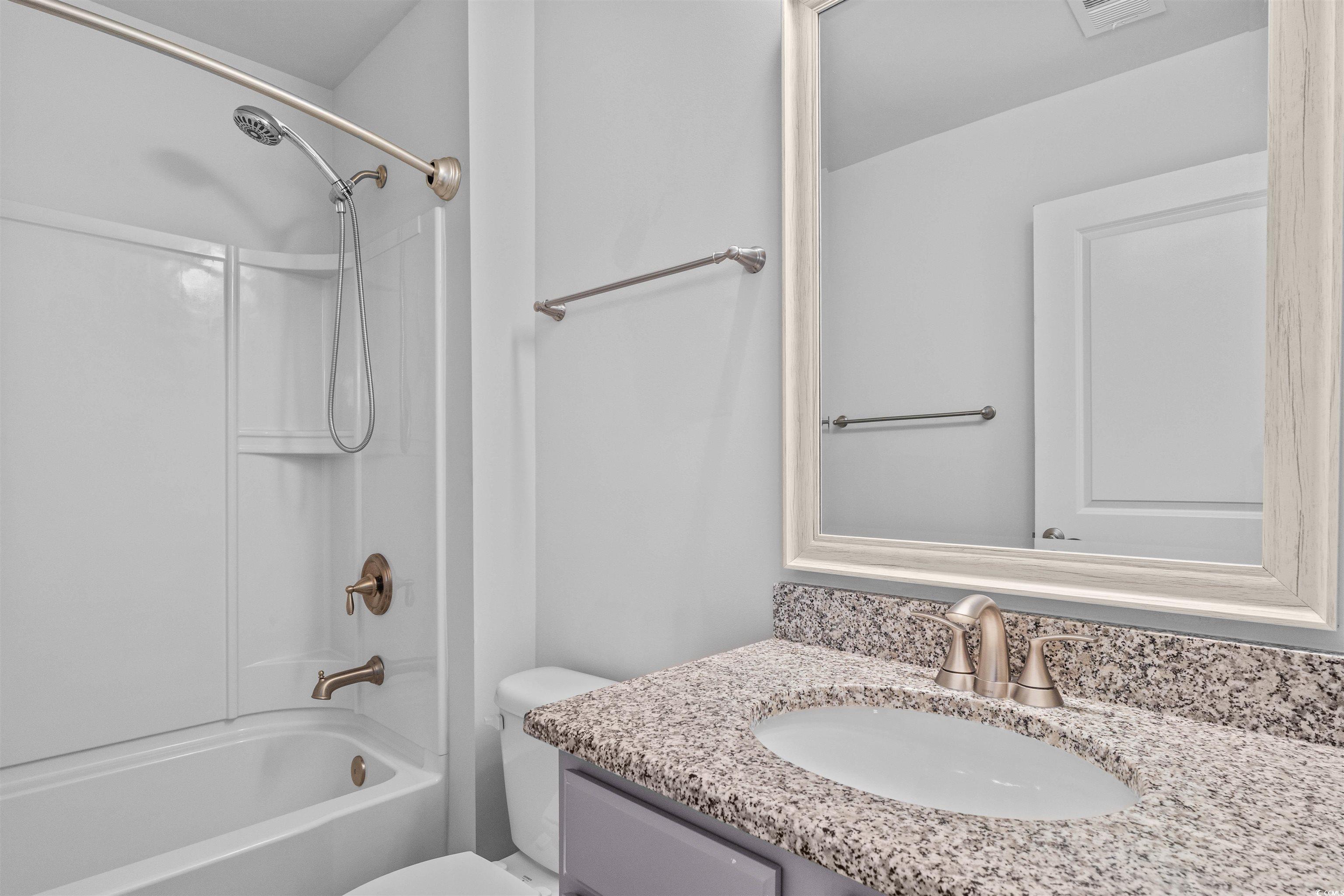 1141 Bronwyn Circle North Myrtle Beach, SC 29582 - Photo 26 of 40 Bathroom featuring shower combination and vanity