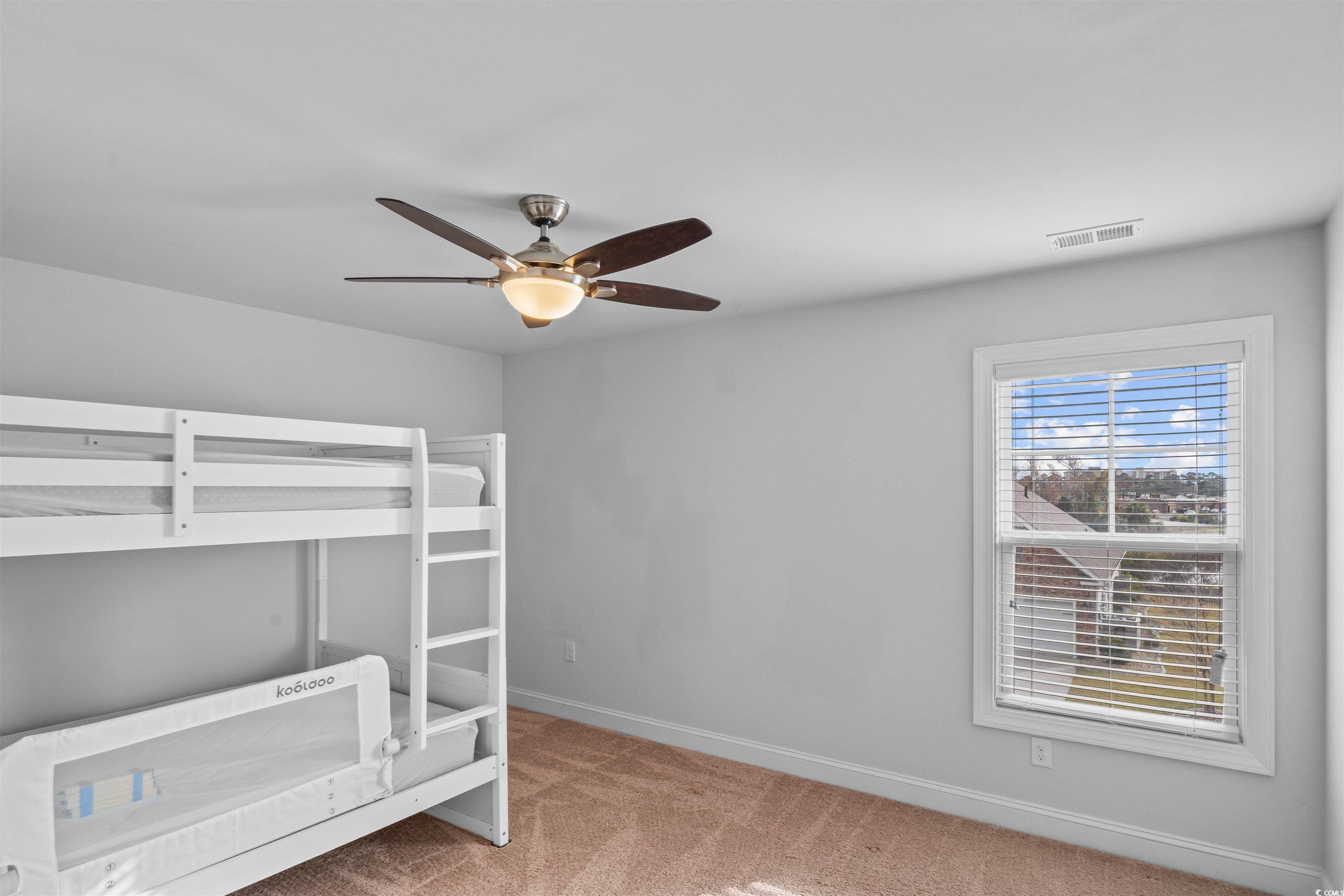 1141 Bronwyn Circle North Myrtle Beach, SC 29582 - Photo 32 of 40 Unfurnished bedroom featuring light colored carpet and a ceiling fan