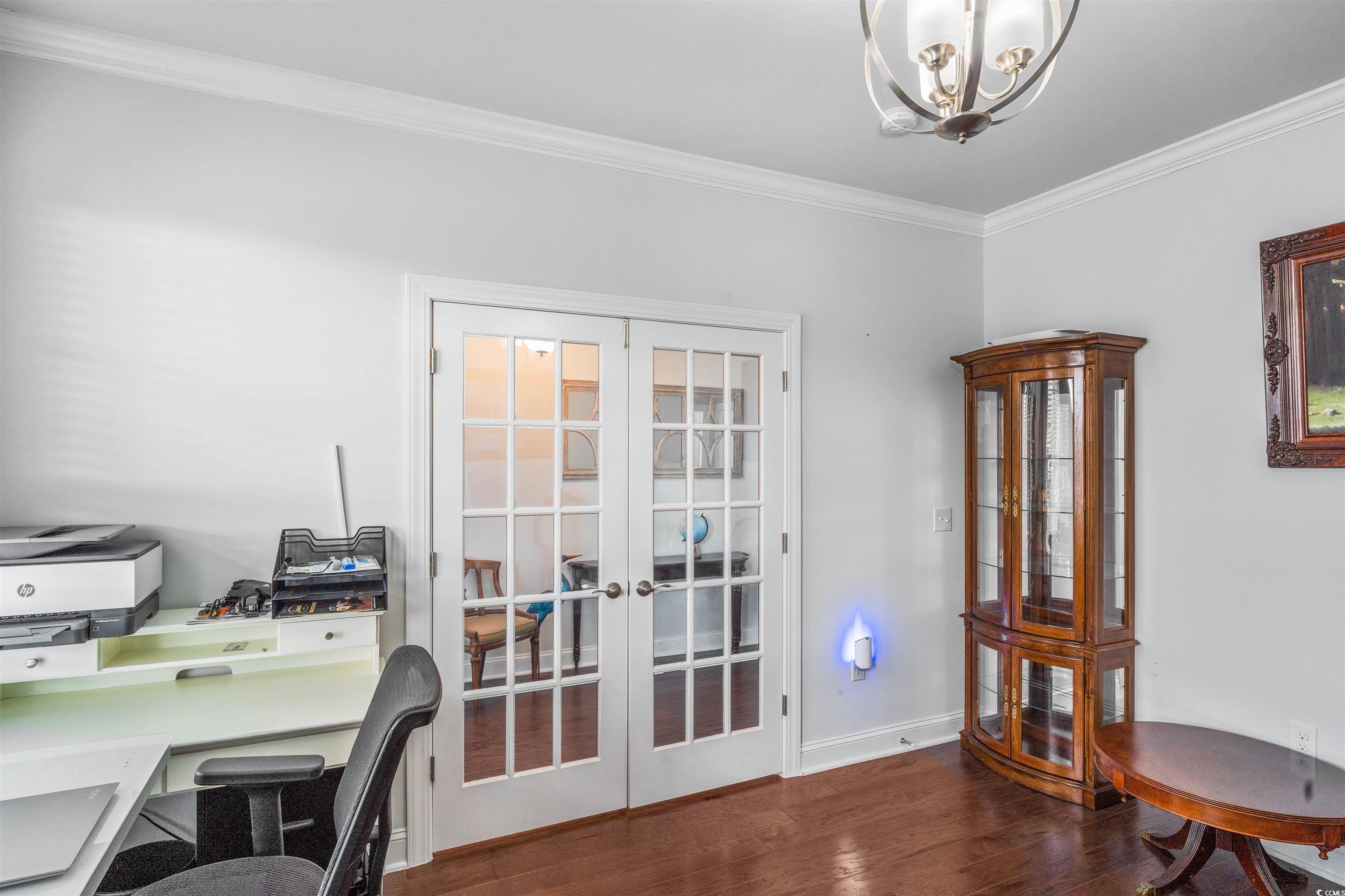 1141 Bronwyn Circle North Myrtle Beach, SC 29582 - Photo 6 of 40 Home office featuring french doors, crown molding, a chandelier, and dark wood-style floors