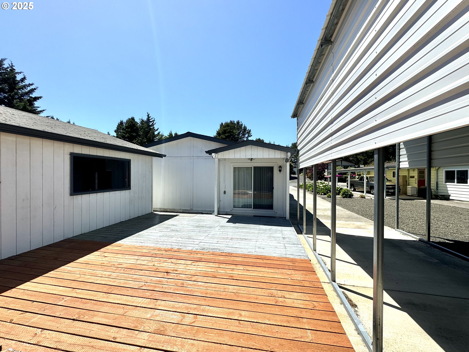 1601 Rhododendron Drive, Unit 676 Florence, OR 97439 - Photo 31 of 36 a view of a house with sitting area