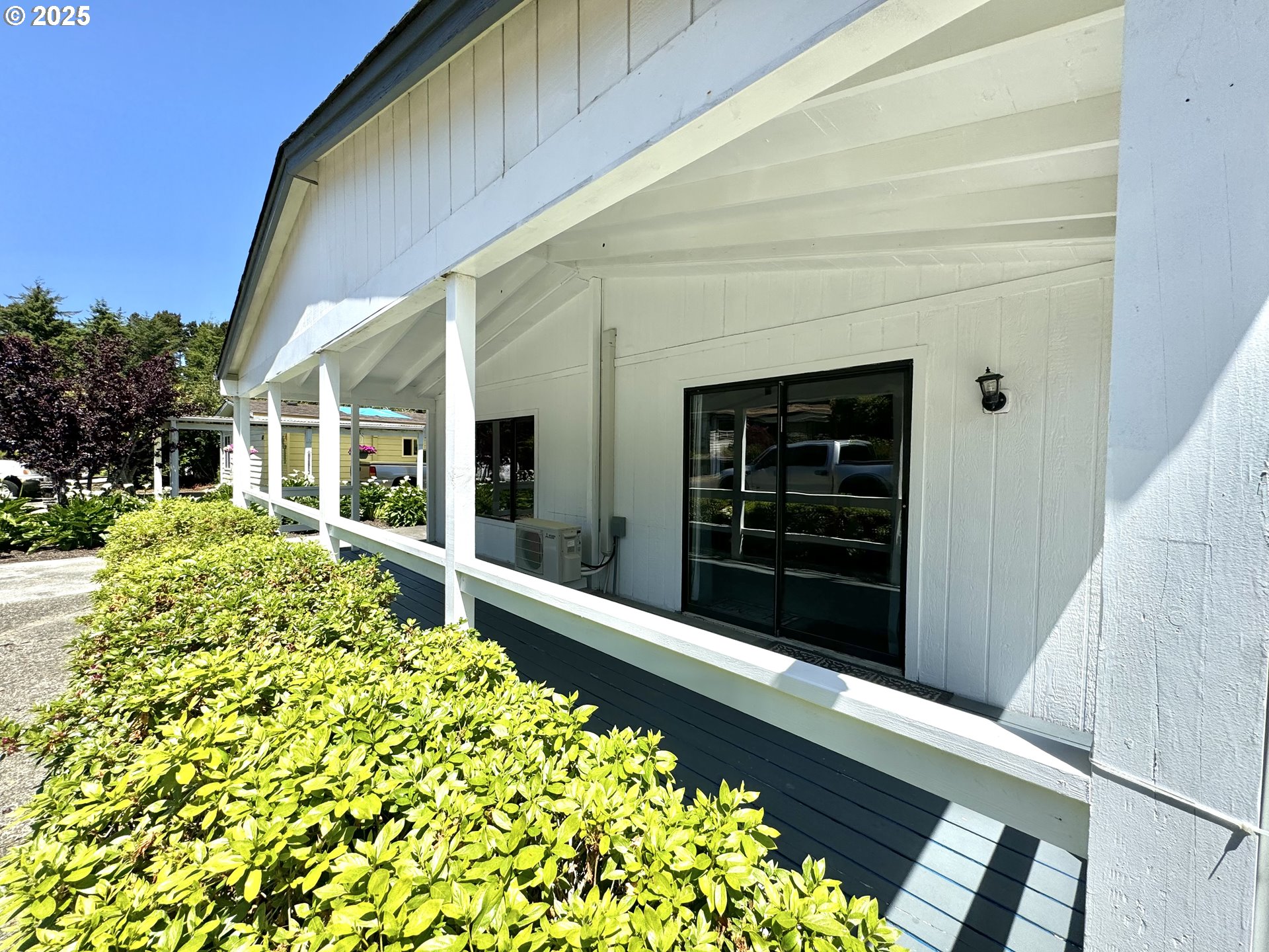 1601 Rhododendron Drive, Unit 676 Florence, OR 97439 - Photo 34 of 36 a front view of a house with a large window