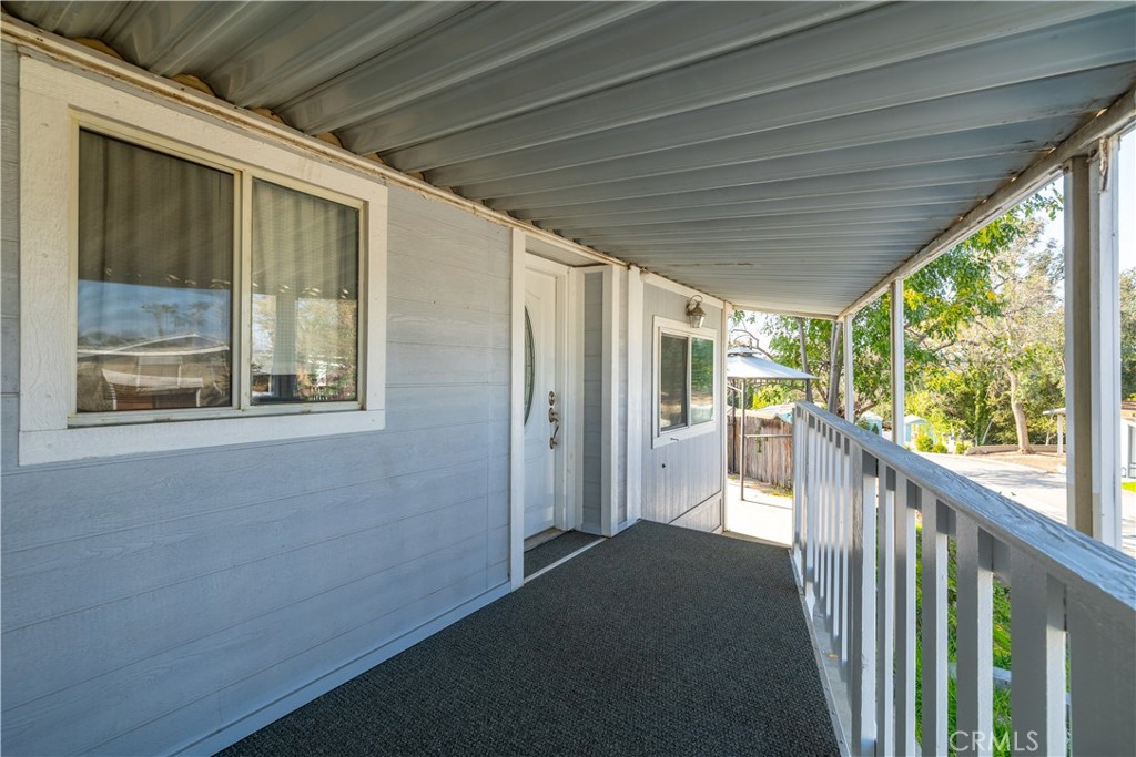 15181 Van Buren, Unit 90 Riverside, CA 92504 - Photo 17 of 27 a view of a porch